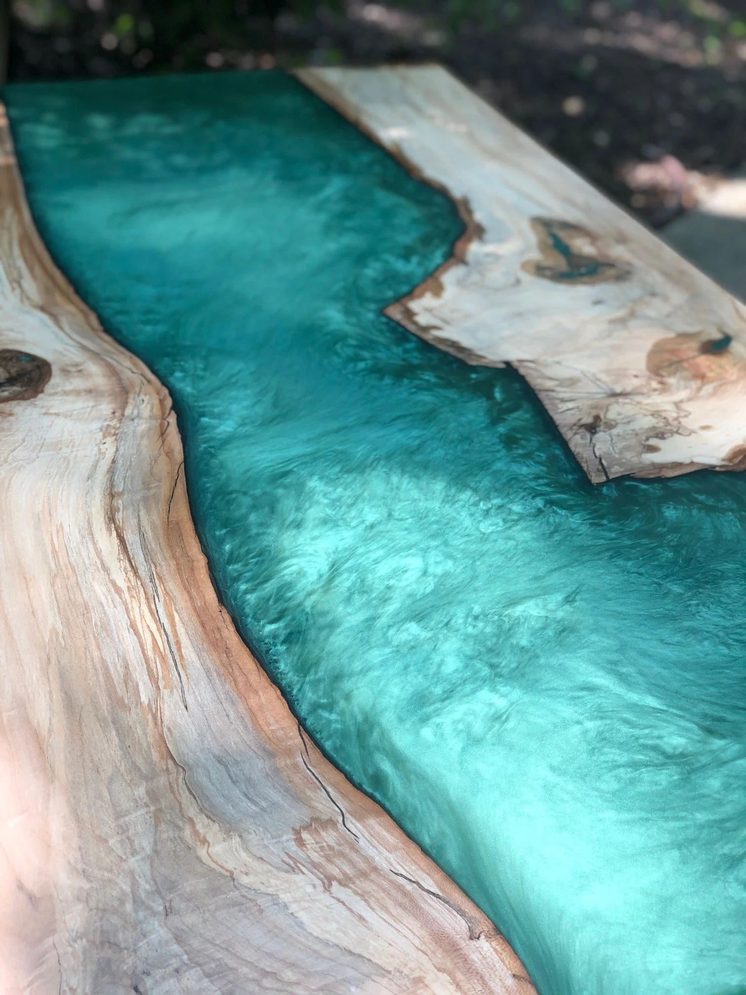 36" x 60" spalted maple table with a gorgeous aquamarine resin
