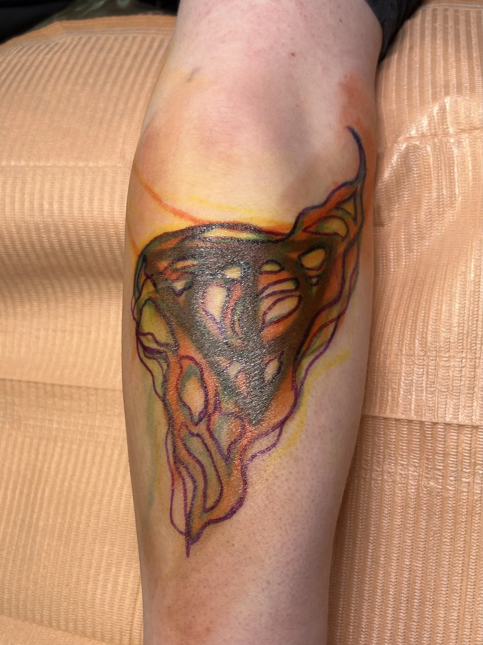 abstract, drawn-on blackwork cover up