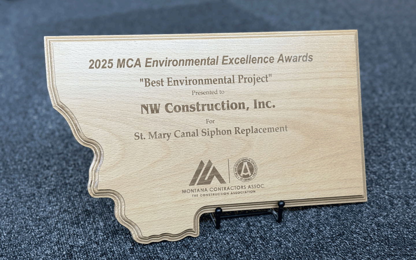 wooden plaque award for 2025 MCA Environmental Excellence Awards Best Environmental Project NW Construction