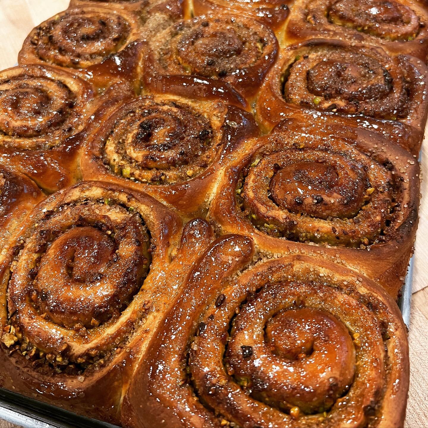 Cardamom Pistachio Rolls with Honey Glaze @nytimes Snagging one of these fragrant beauties might be one of the best decisions you will make today! #nytimescooking #yumbuns