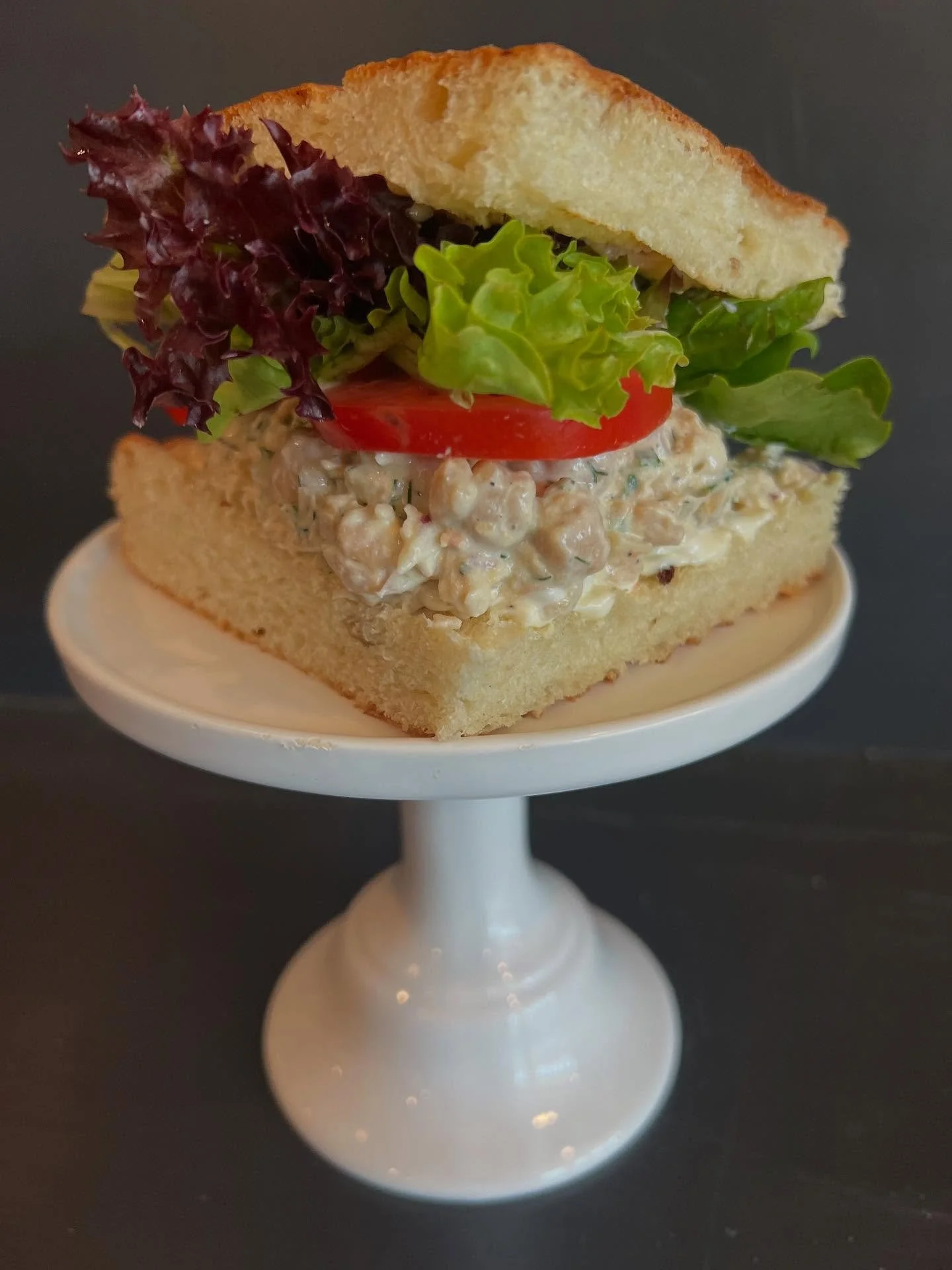 Chickpea Salad Sandwich 

Meet your new favorite veggie sandwich 🌿✨ Chickpeas salad made with crunchy celery, zesty red onions, and a tangy yogurt-herb sauce&mdash;piled high on our house-made focaccia. Finished with juicy tomatoes and fresh-picked 