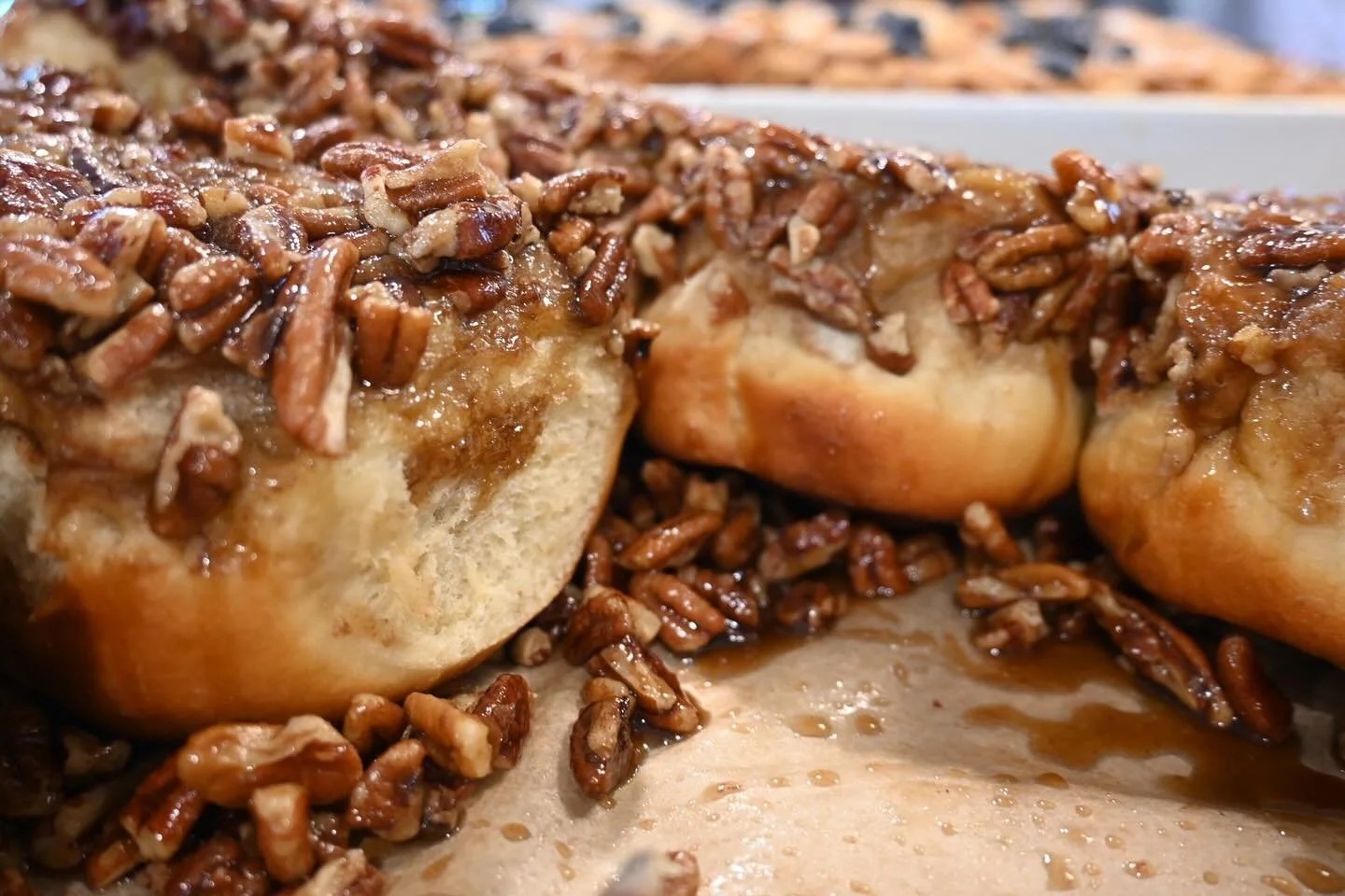 Check out the case this morning! Pecan sticky buns fresh from the oven and blueberry French toast bread pudding!  Come get &lsquo;em while they are still hot! #langleykitchen