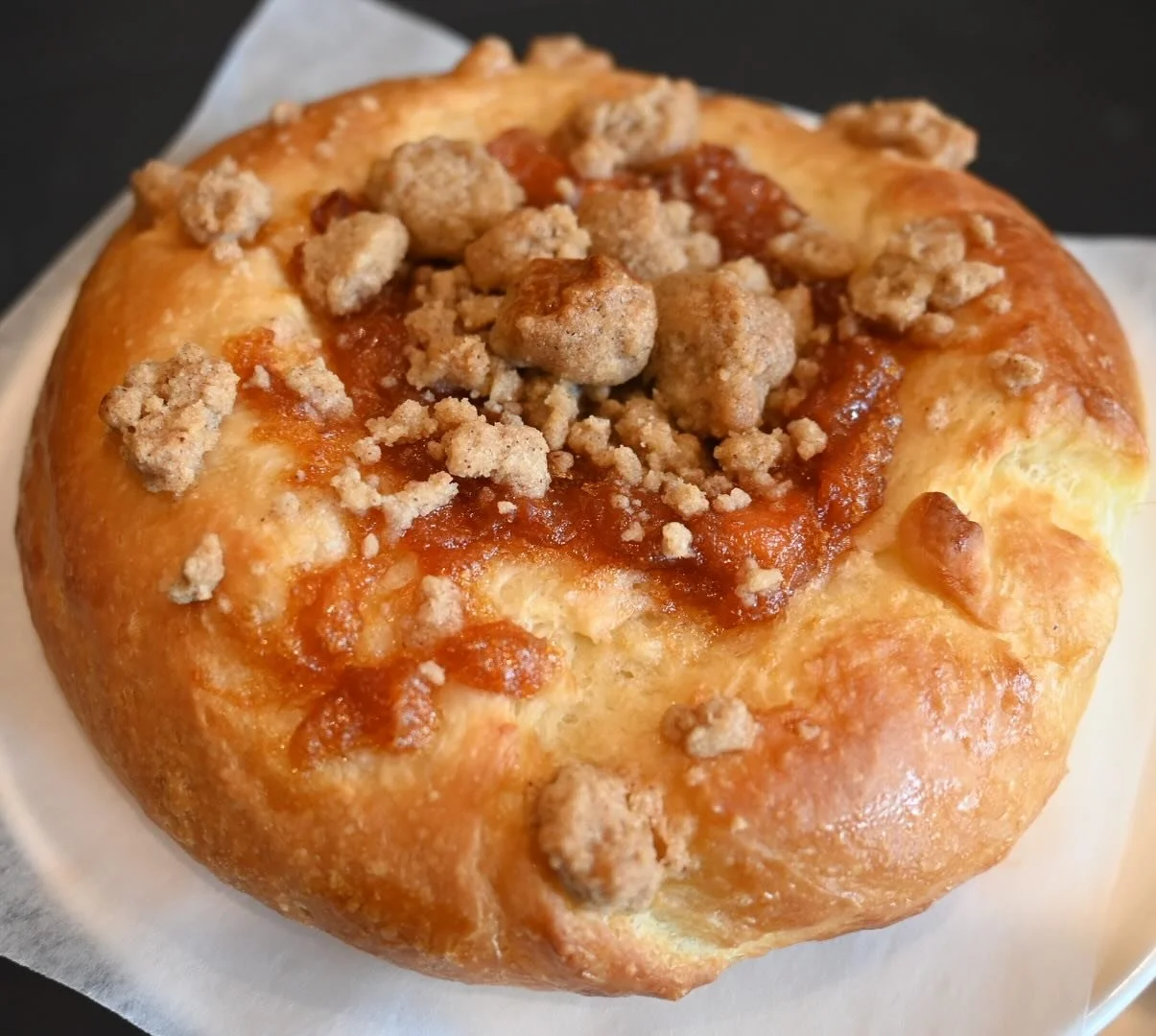 Peach crumble brioche fresh out of the oven this morning!  While you are here, take home some chicken verde enchiladas for dinner with a bottle of Eidosela Albari&ntilde;o. We promise you won&rsquo;t be disappointed. (In a hurry? Order your enchilada