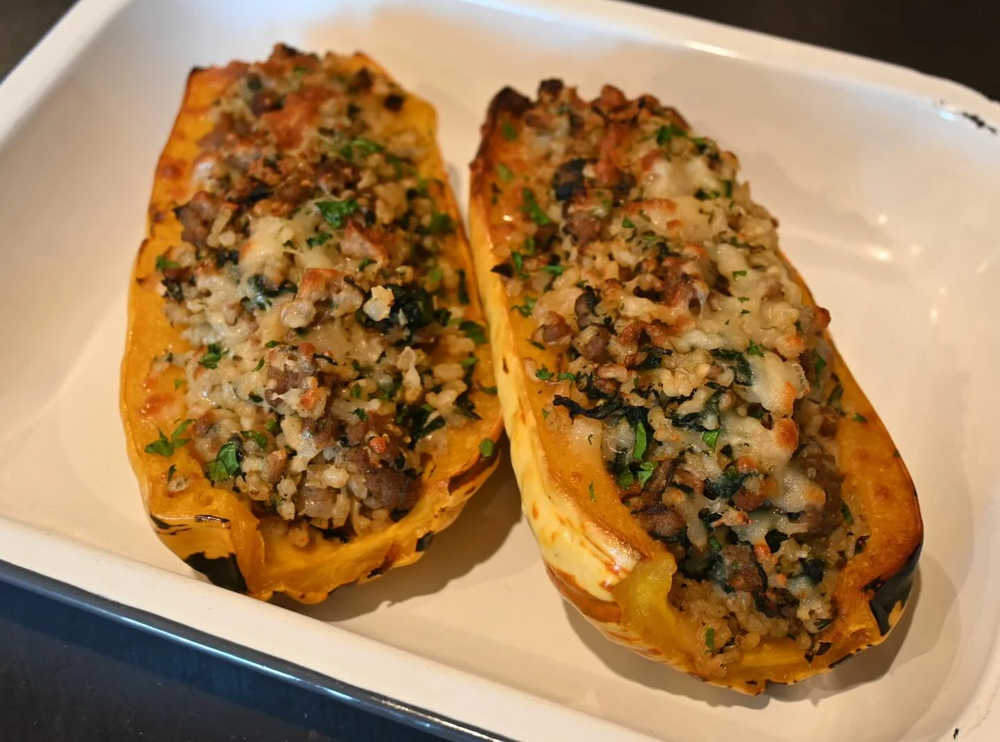 We have some exciting dinner options at Langley Kitchen this week. Today, we are starting with take and bake stuffed organic delicata squash. Featuring local Three Sisters pork sausage, brown rice, spinach and fresh herbs, this is a hearty and delici