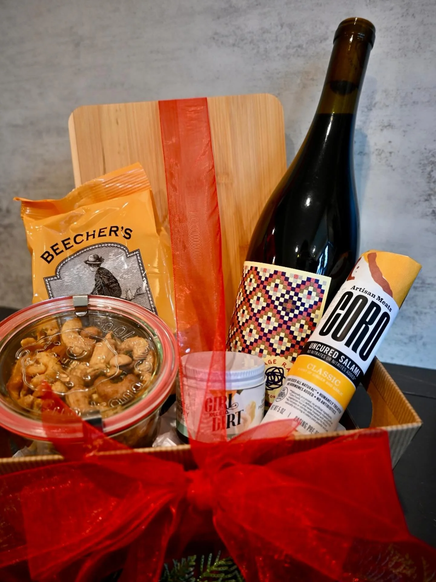 Looking for a thoughtful holiday gift for someone you care about?  We&rsquo;ve curated several special options featuring a combination of housemade Langley Kitchen items and our favorite local products. Our wine and charcuterie basket includes your c