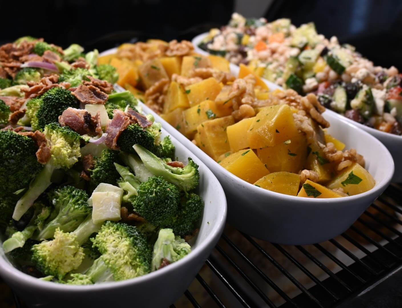 Our cold case is always full with a variety of fresh salads, including fan favorites and seasonal variety.  This week we have a Greek Salad with White Beans, Wild Rice with Chard &amp; Fennel, Broccoli with Bacon &amp; Red Onion, Mixed Fruit, and Roa