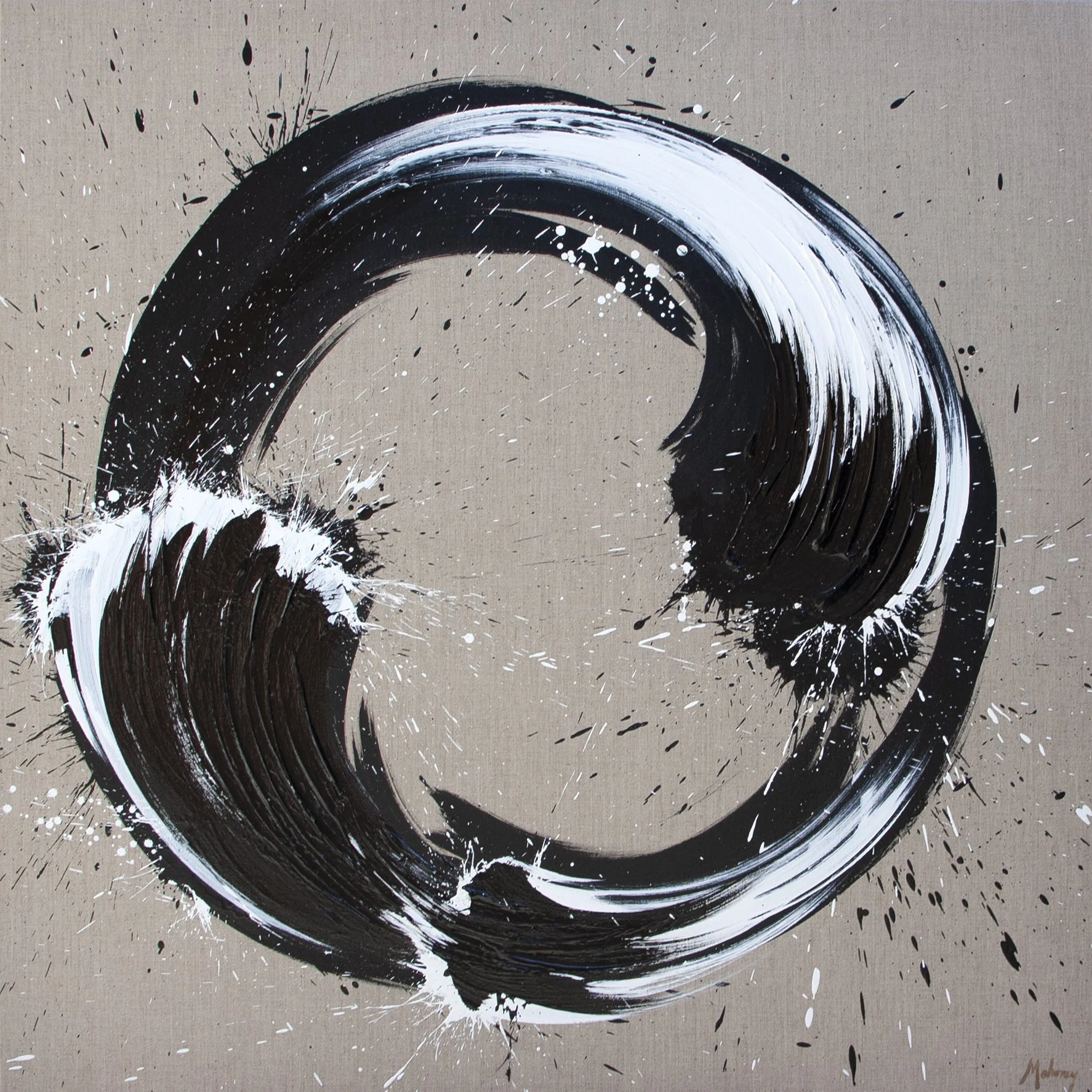 Abstract black and white circular brushstroke with splatter paint on beige background.