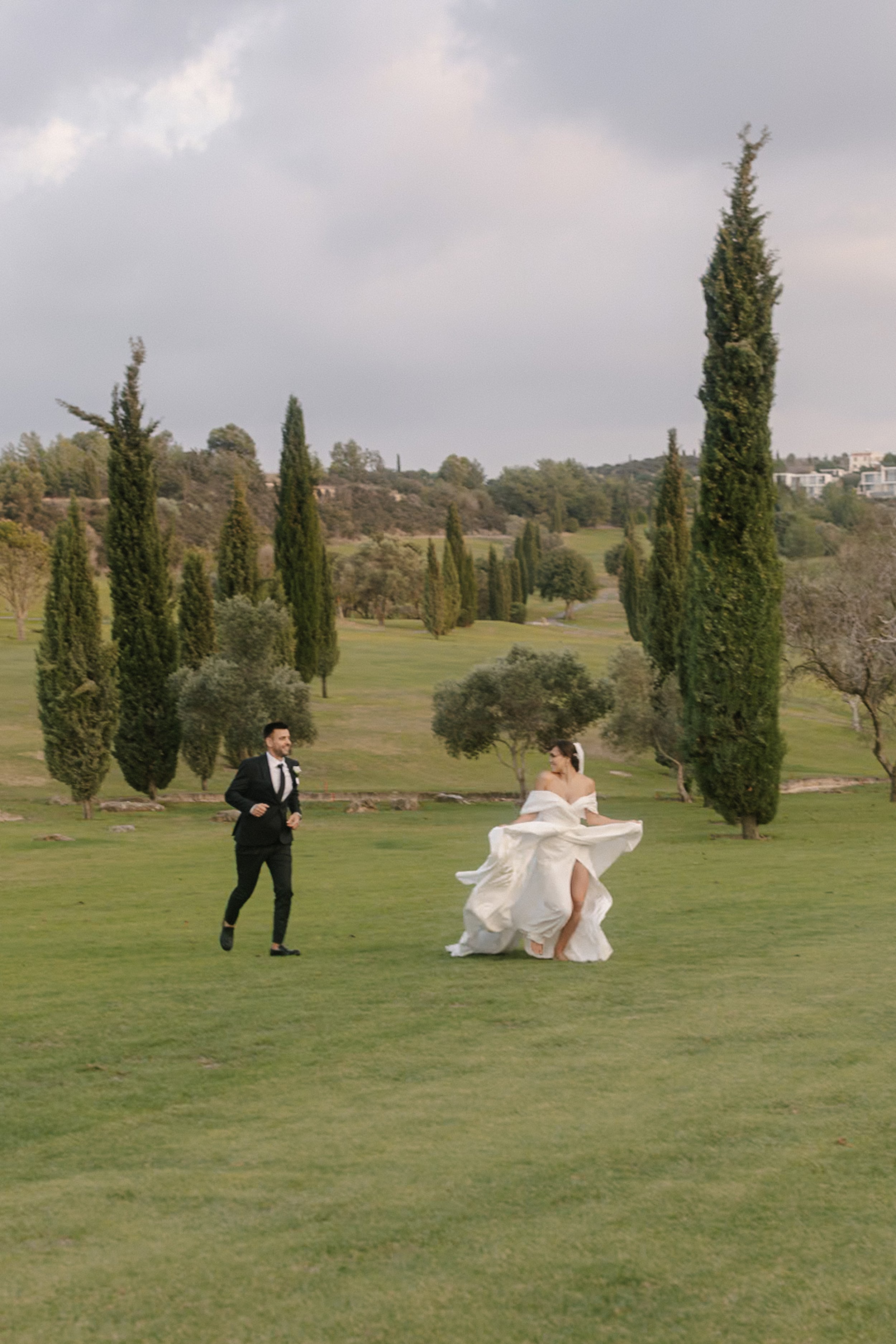 Intimate Destination Wedding at Minthis Hills, Cyprus: A Joyful Celebration Amidst Lush Greens