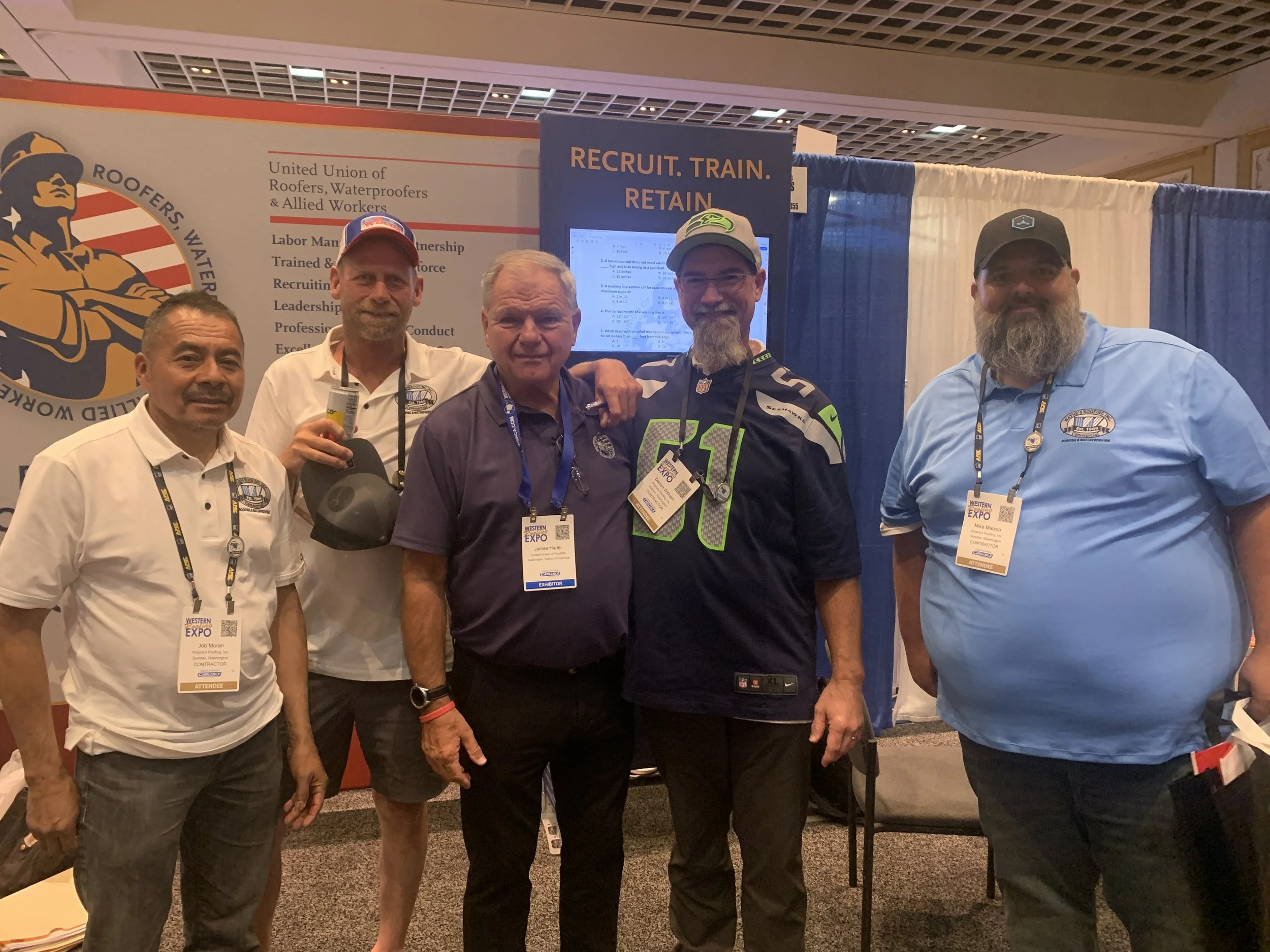 Wayne's Roofing foremen with James Hadel (international president) at the Roofing Expo held in Las Vegas this year.