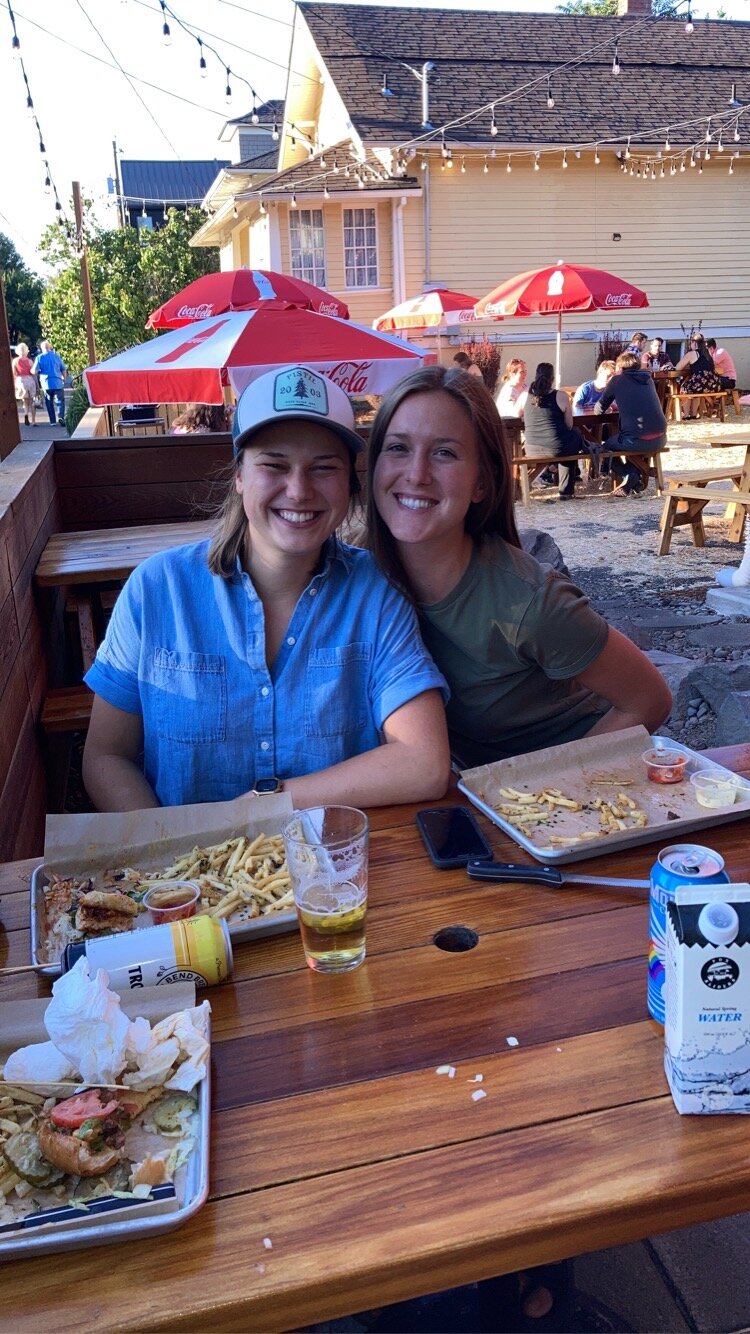 Annie and Chloe with a little ore-protest food and encouragement in Portland. 
