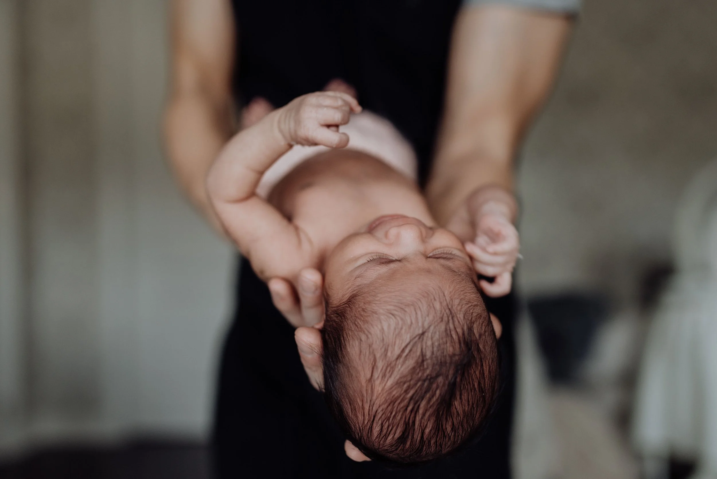 Parent holding newborn Pittsburgh doula