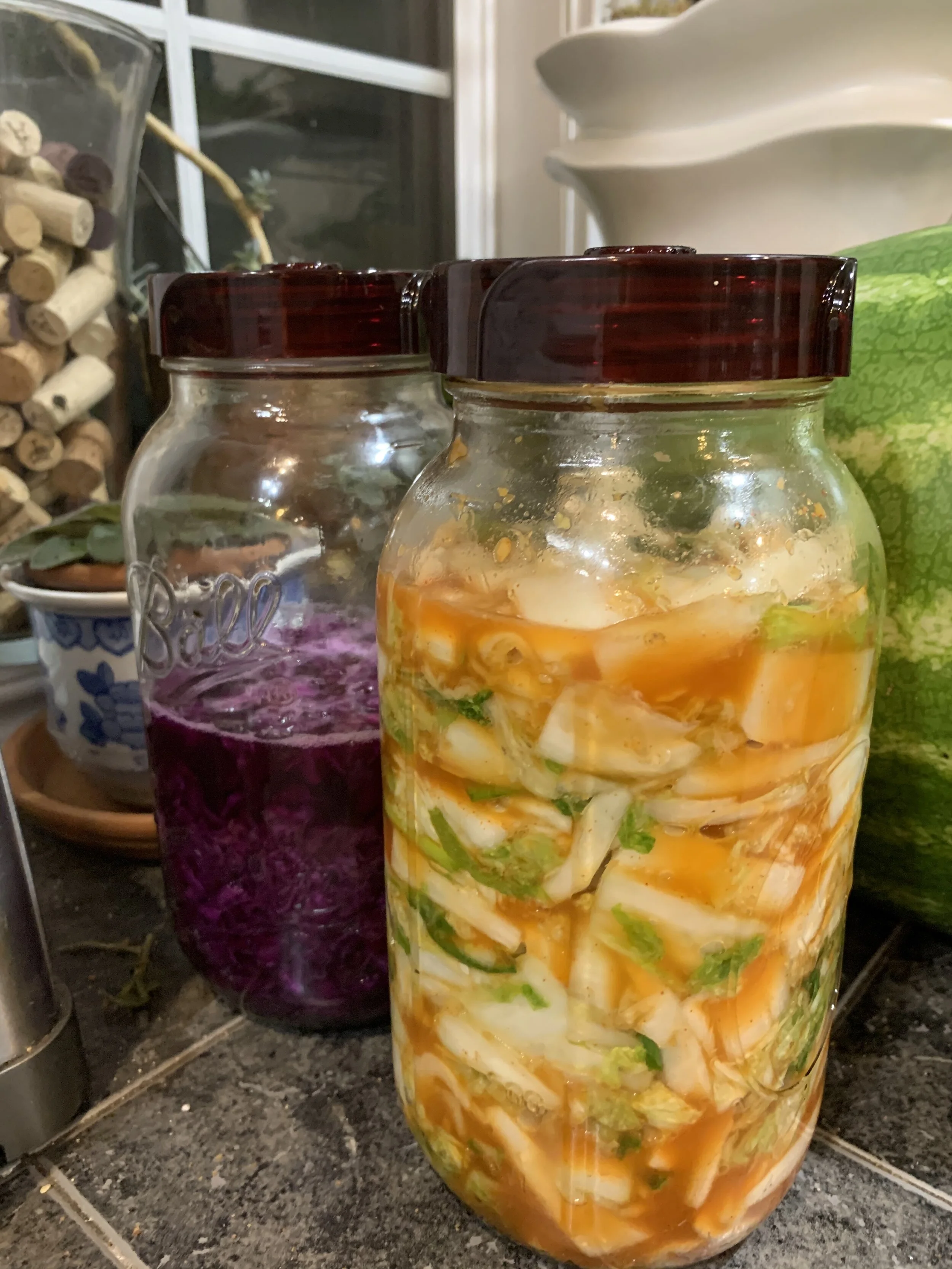 Kimchi and sauerkraut. These airlock lids weren’t expensive but were a game changer in terms of how easy they make it to make fermented foods.