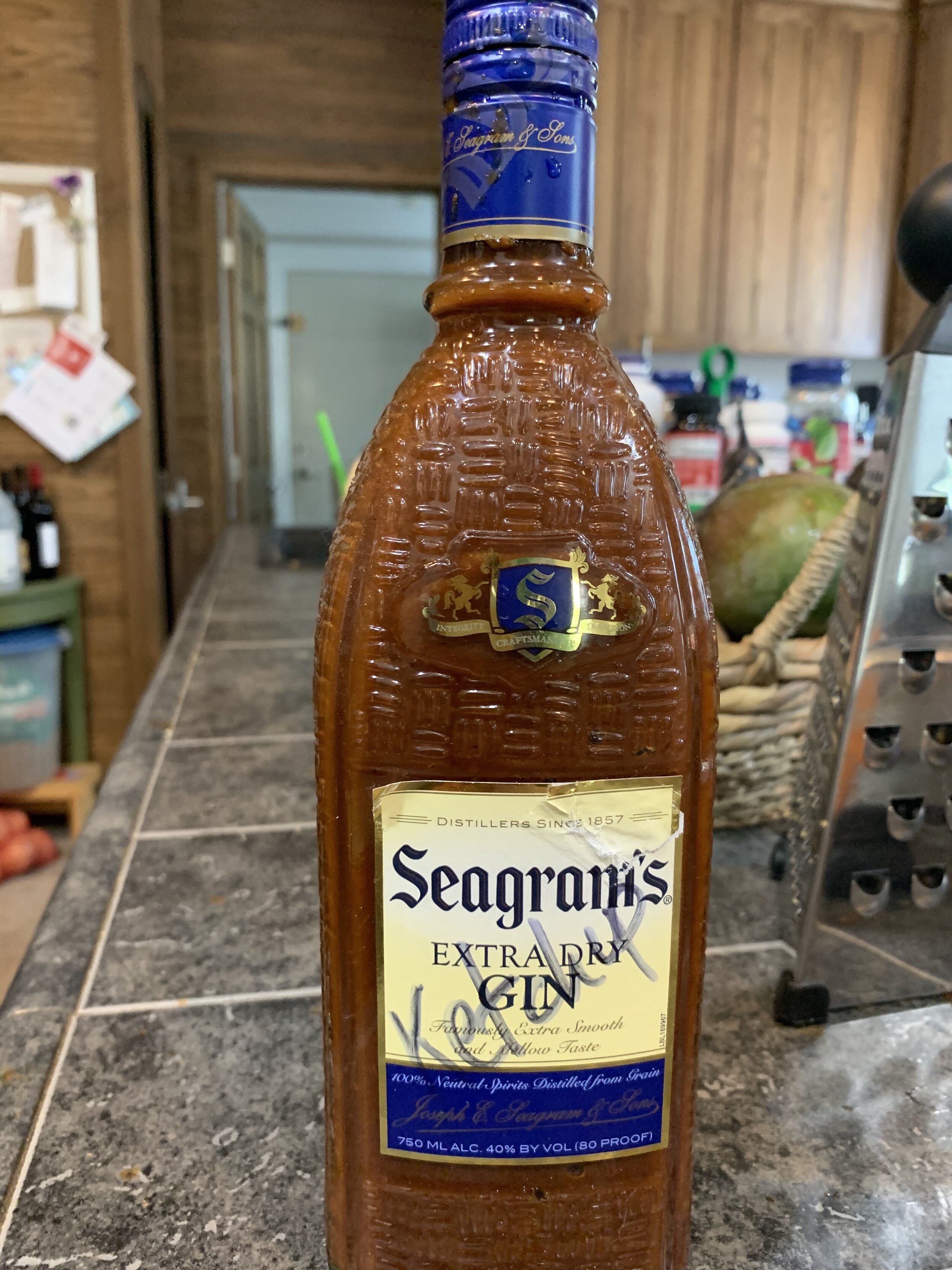 Ce n'est pas une bouteille de gin - this is homemade ketchup to use up all the tomatoes we grew. Different, but legitimately better than commercial ketchups.