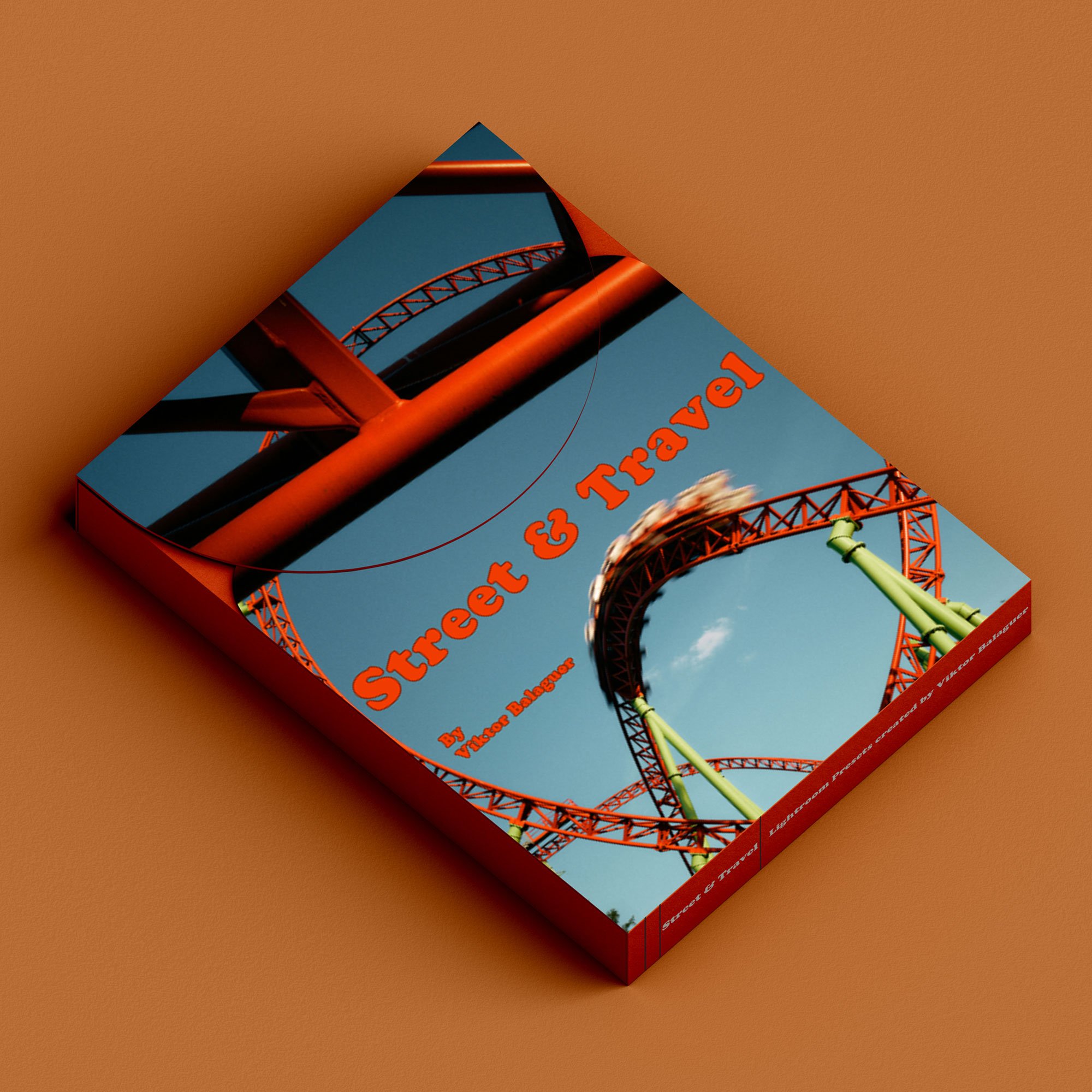 A book titled 'Street & Travel' by Victor Bolognese featuring a colorful roller coaster on the cover.