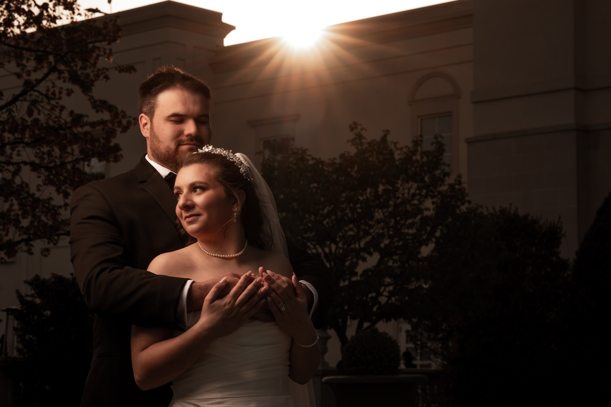 "New Jersey Wedding Photographer" a bride and groom pose in front of "The Palace at Somerset Park"