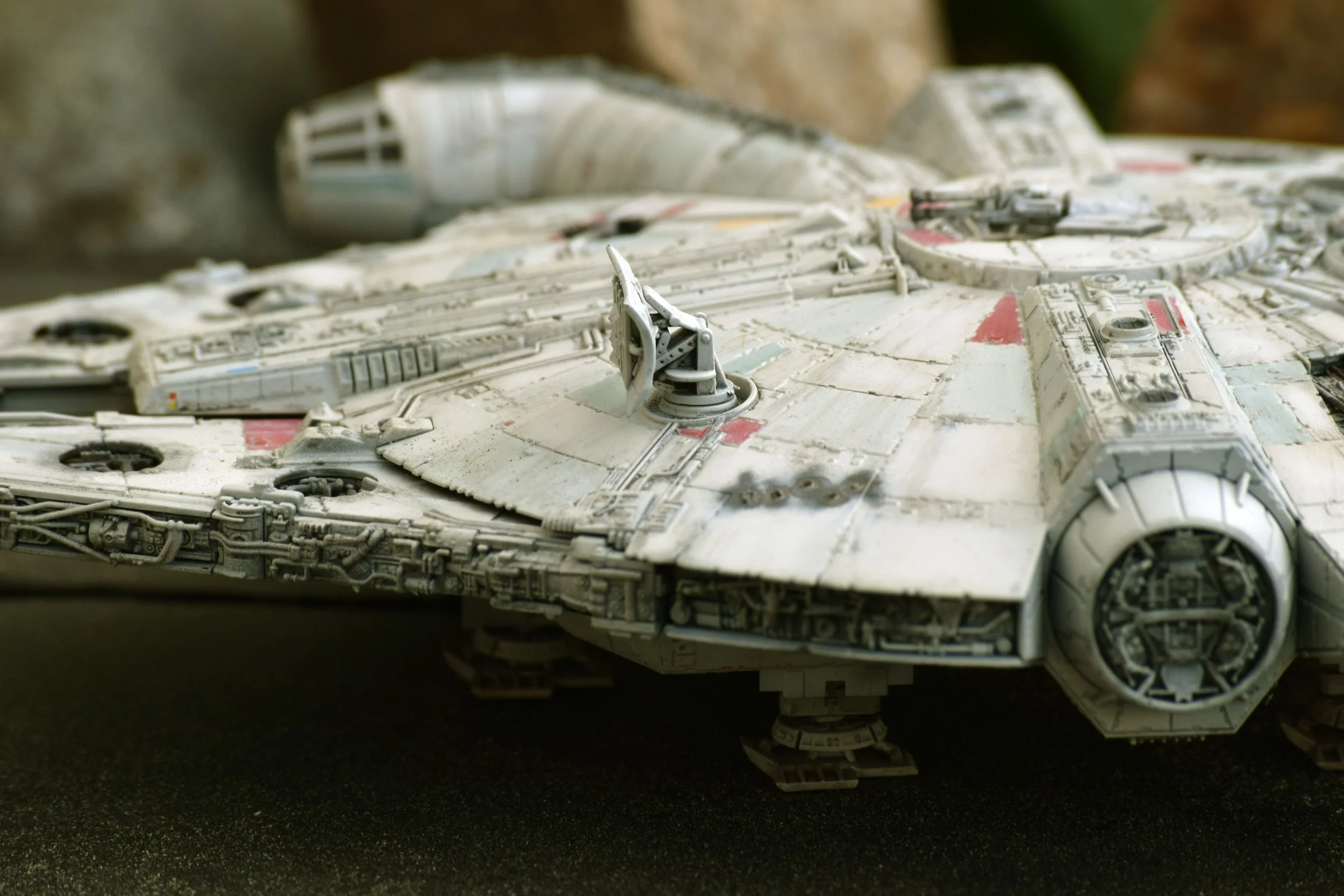 Using a heated skewer, I carved blaster marks into the hull to match filming model reference photos.