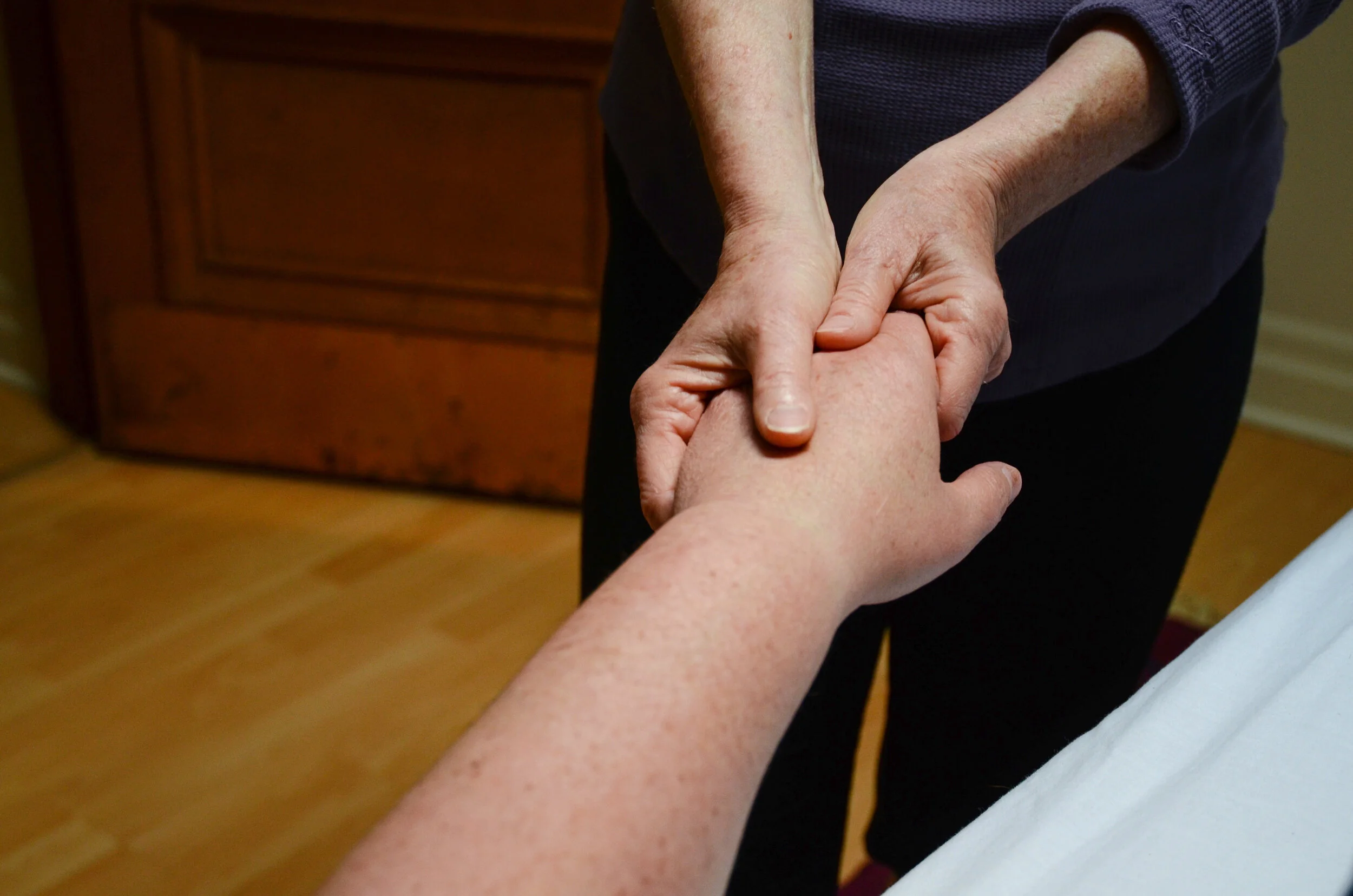 Photo of an hand receiving a massage