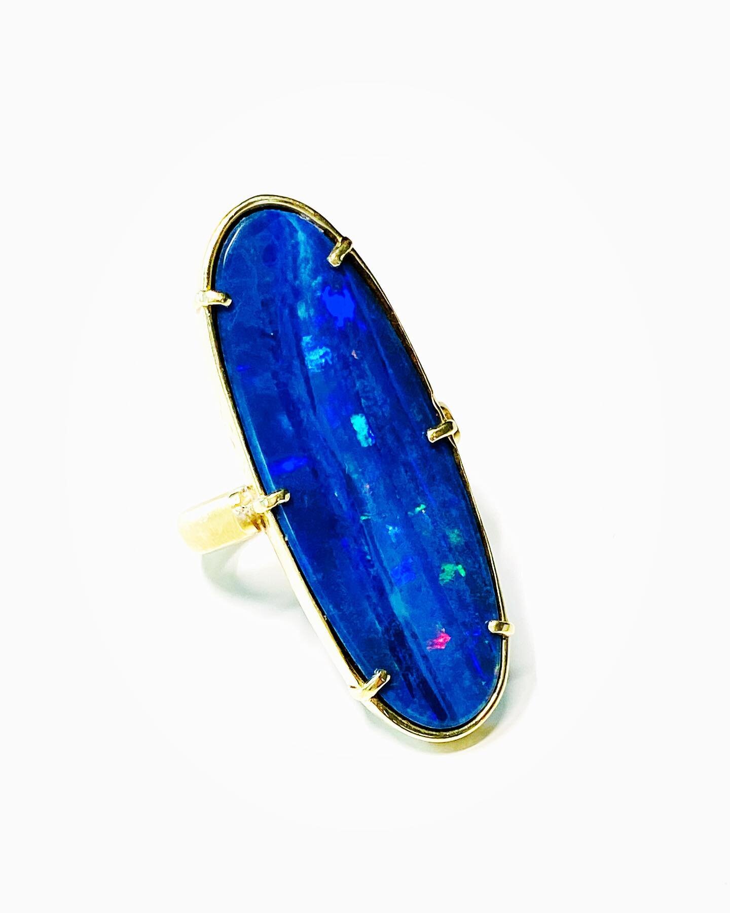 This dreamy eighteen karat yellow gold ring is prong set with an long oval blue opal doublet displaying spectral colors. Available to own now!
.
.
.
.
#theresecrowedesignltd #customjewelry #jewelrydesigner #opaldoublet #ring #neverenoughrings #jewelr