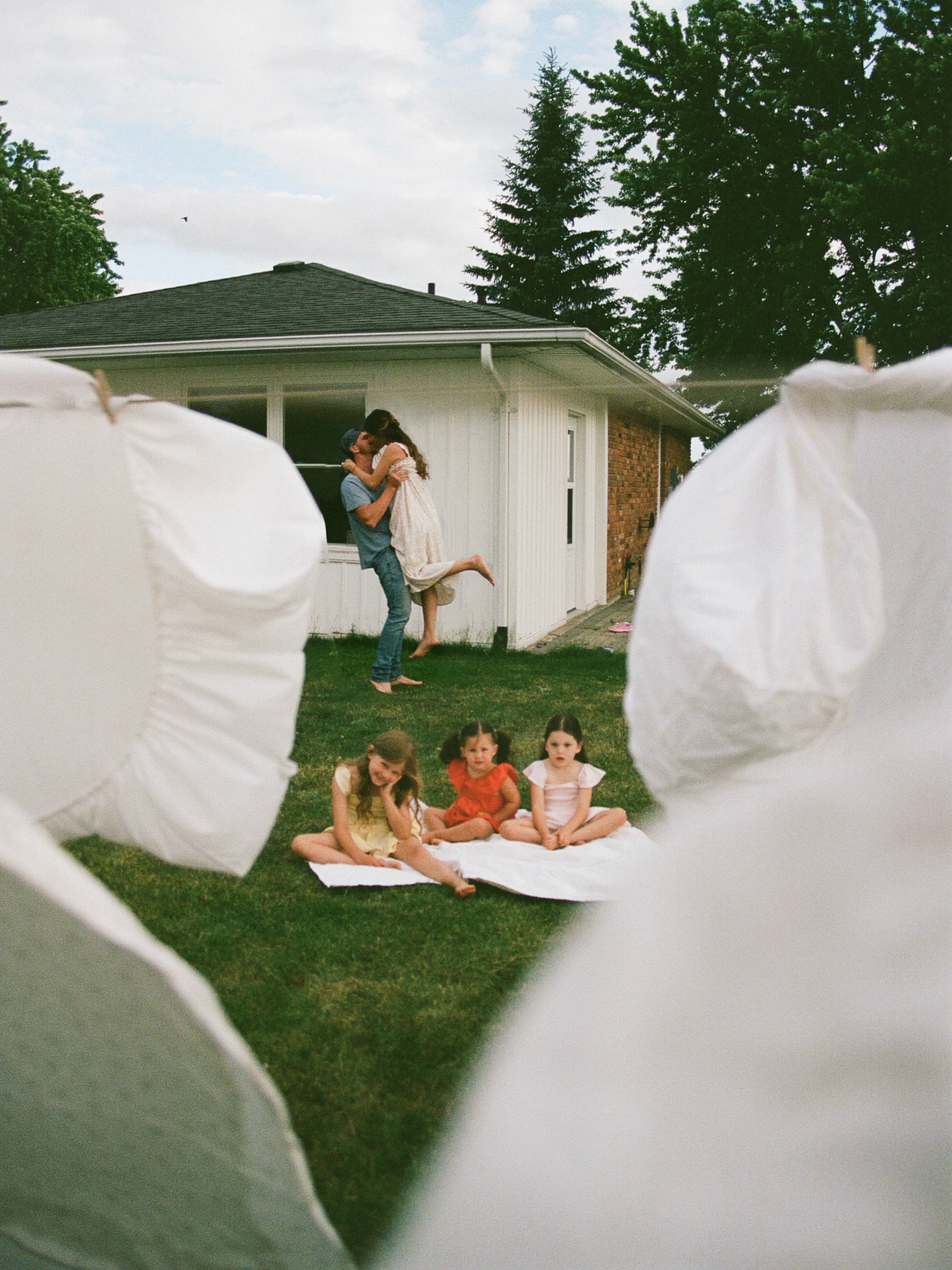 Laundry&rsquo;s piling up&hellip; might as well add one more because the clothesline had one empty spot left. 

All shot on 35mm film 🌸

🏃&zwj;♀️Me running to the post office to mail these rolls of film immediately after their session. 

Told you t