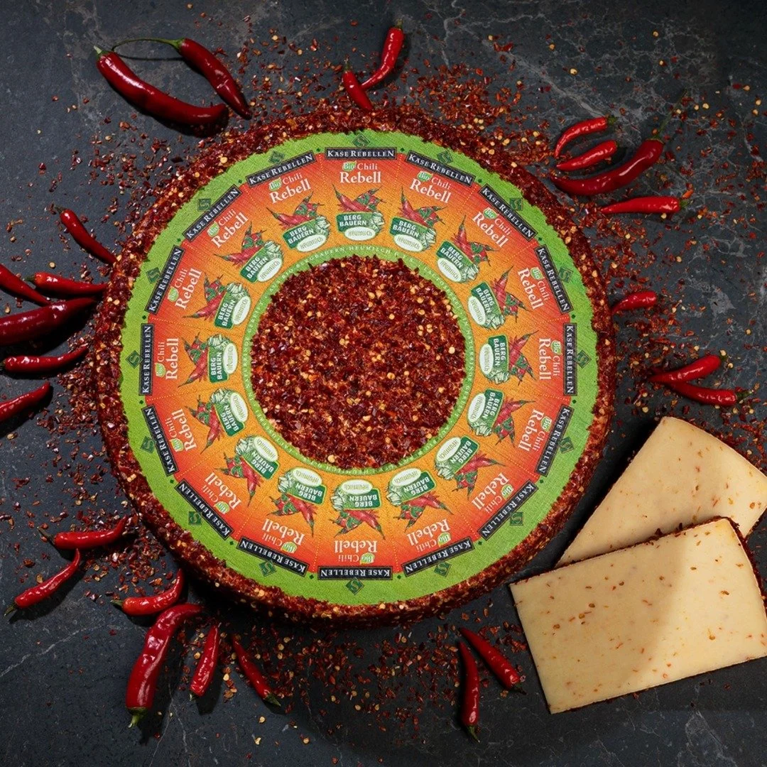 Spice up your charcuterie board with Kase Rebellen&rsquo;s Chili Rebel. This creamy, soft cheese has a delicious blend of peppers, honey, and sour cream.

#abbeyspecialty #kaserebellen #k&auml;serebellen #chili #cheese #milk #dairy #cheeselove #chees