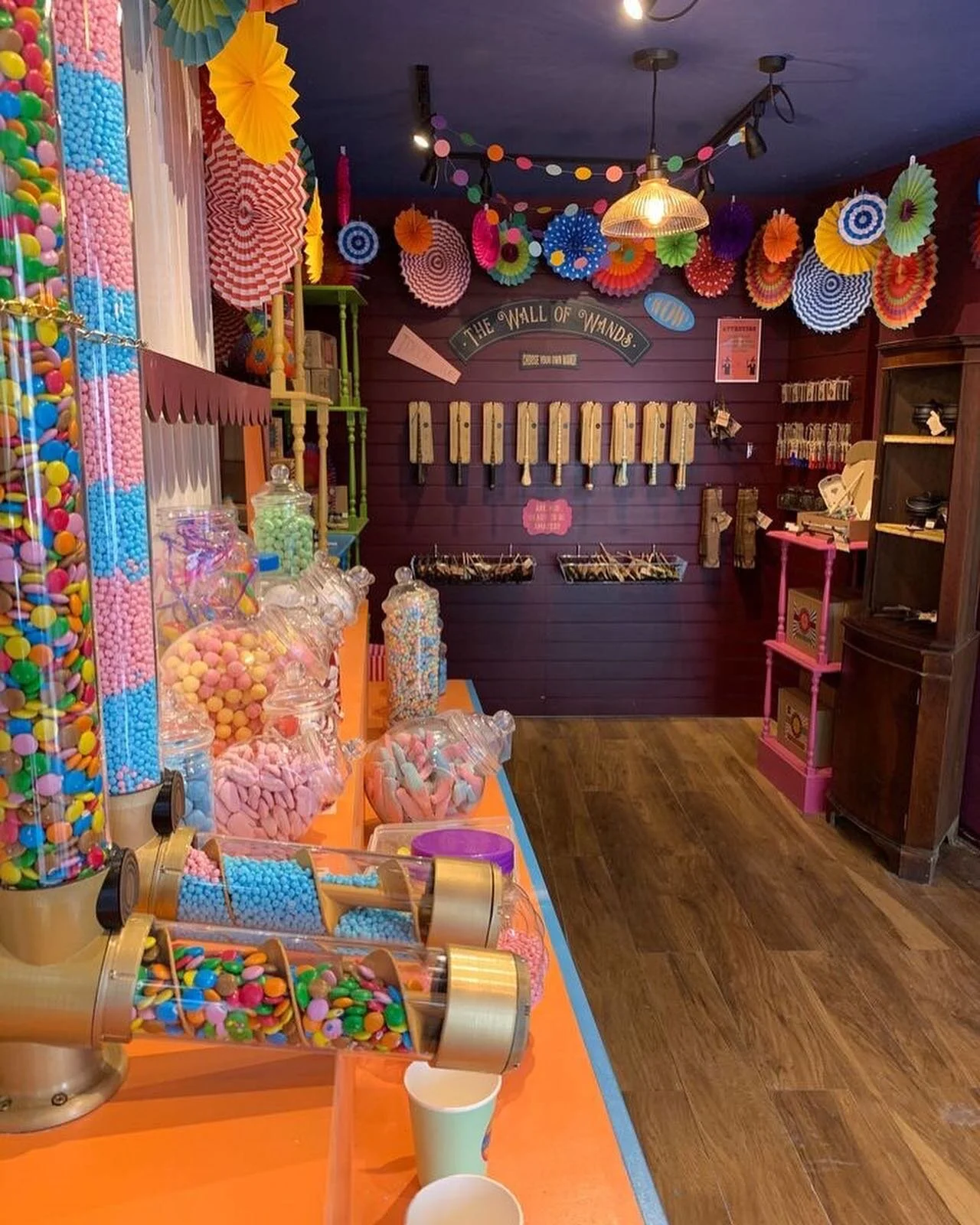 A before &amp; after of our magical shop! 
Featuring our very special Flick &amp; Mix (magic wand activated pick &amp; mix) &amp; Wall of Wands 🍬 ✨ 
#greekstreet #wizardexploratorium #flickandmix #pickandmix #magicalshop #wands #wizards