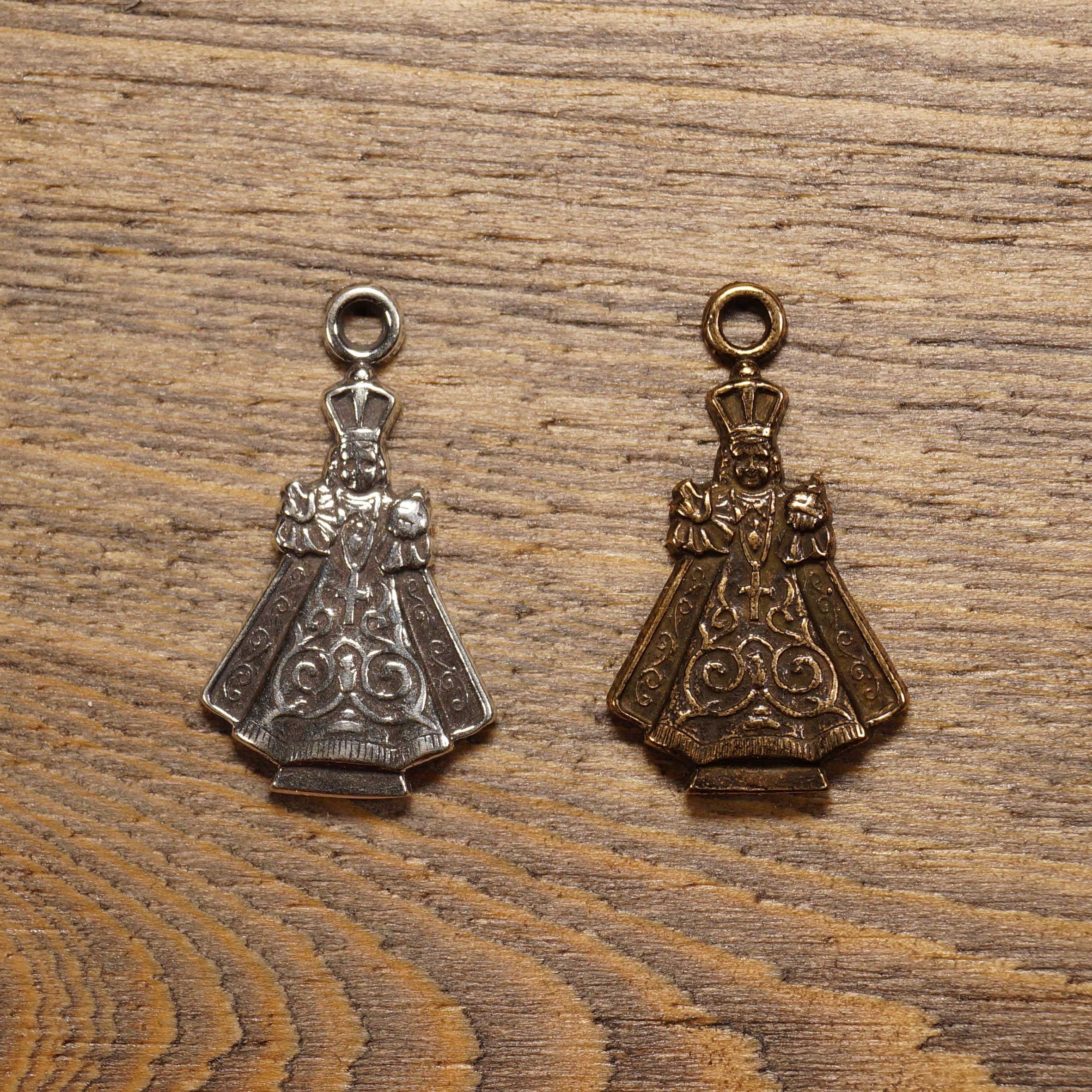 Figural Infant of Prague with Sacred Heart Medal