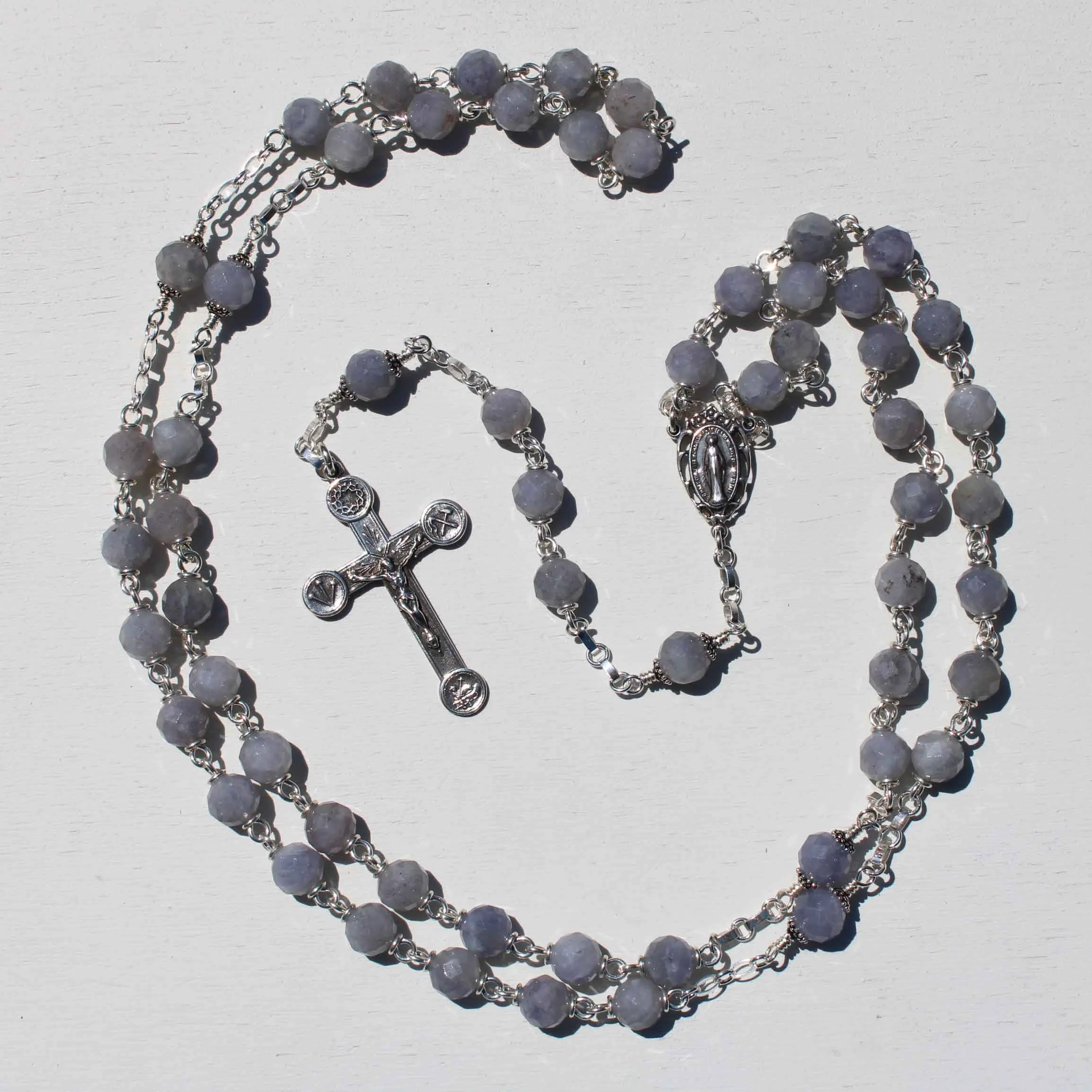 8mm_det_312_faceted_iolite_symbols3.jpg