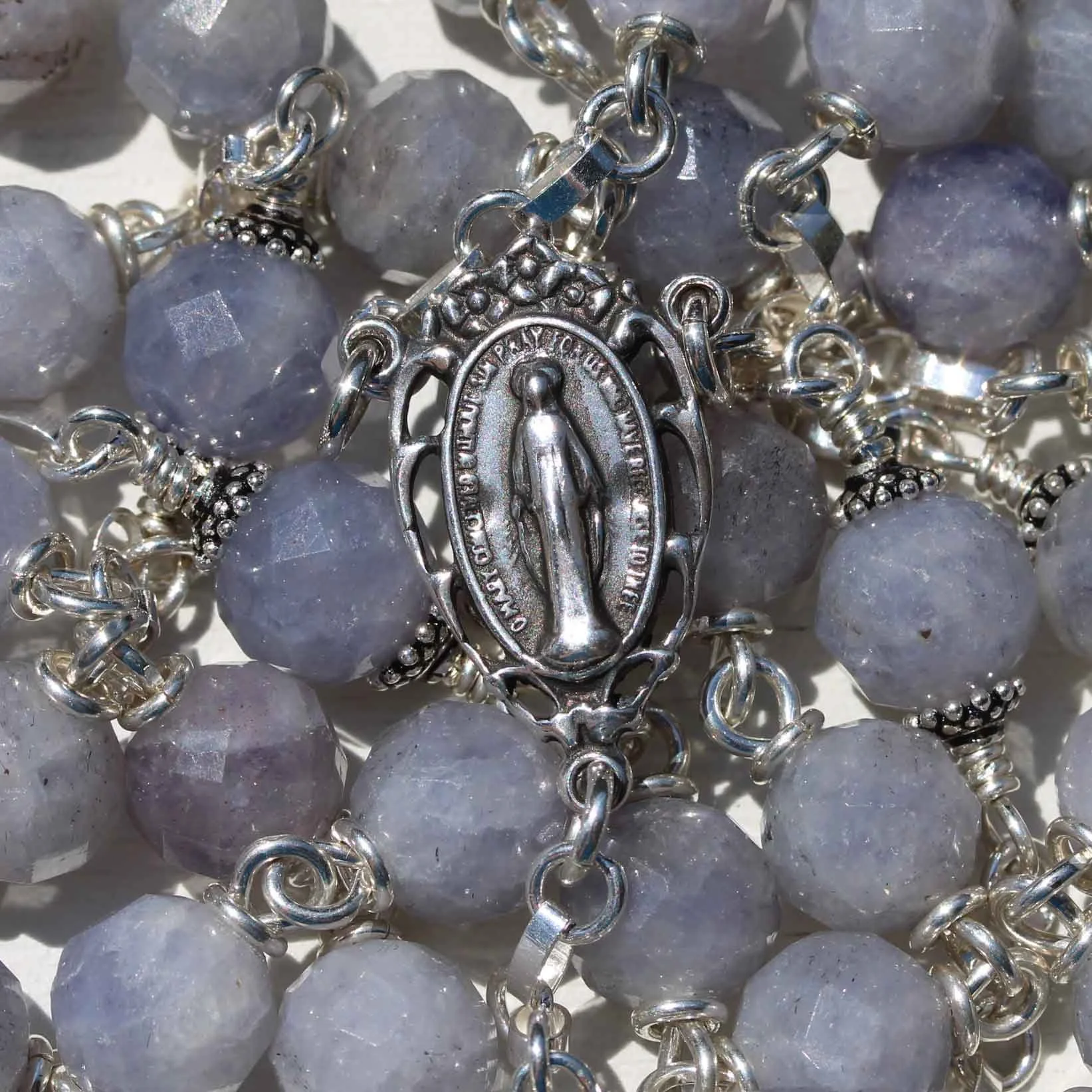 8mm_det_312_faceted_iolite_symbols4.jpg