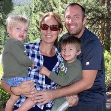 Denae with her husband and boys.