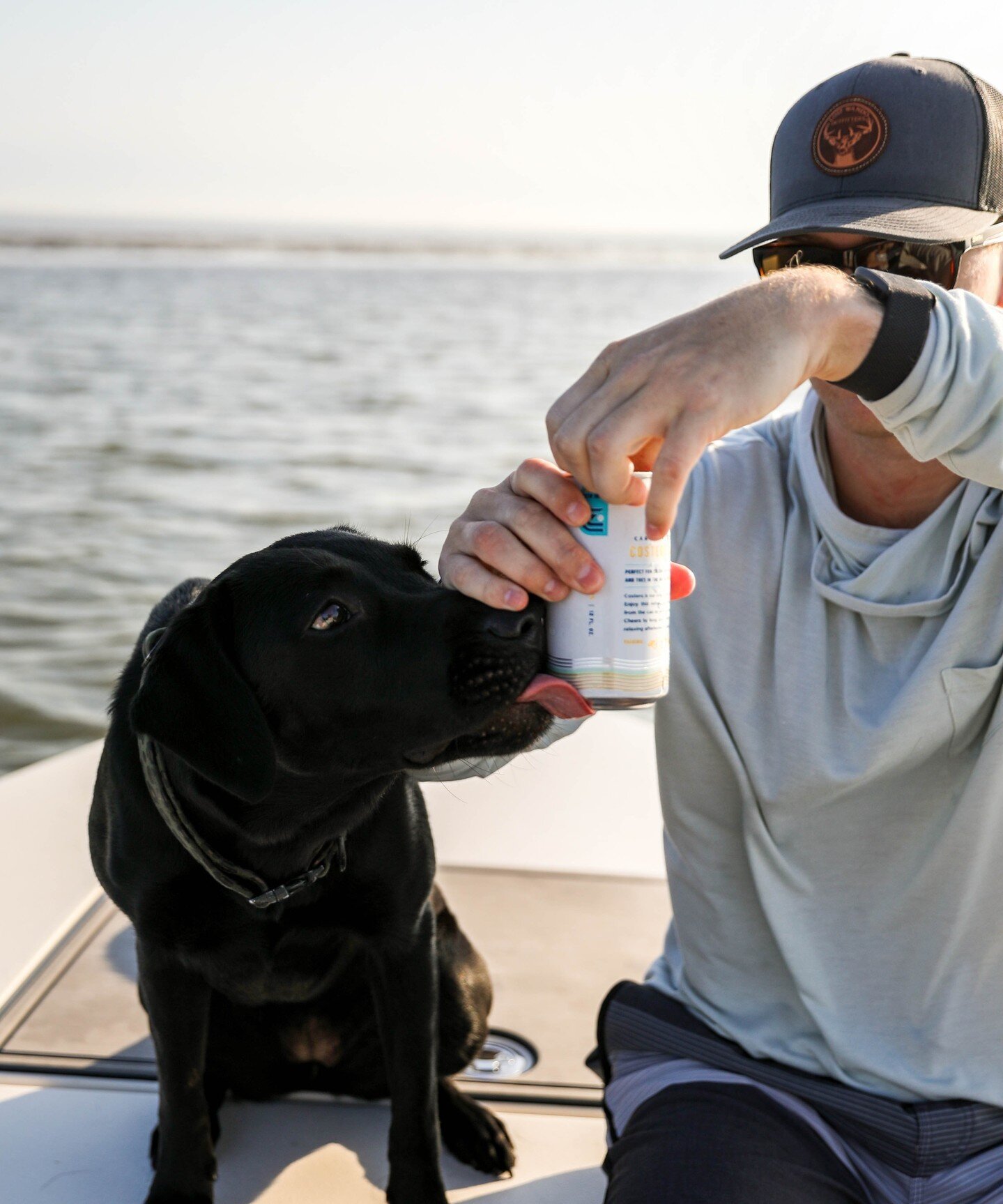 A cold beer in hand and man's best friend by your side somewhere on the water.  Who's In?

📸: @capt_forrest_powpow