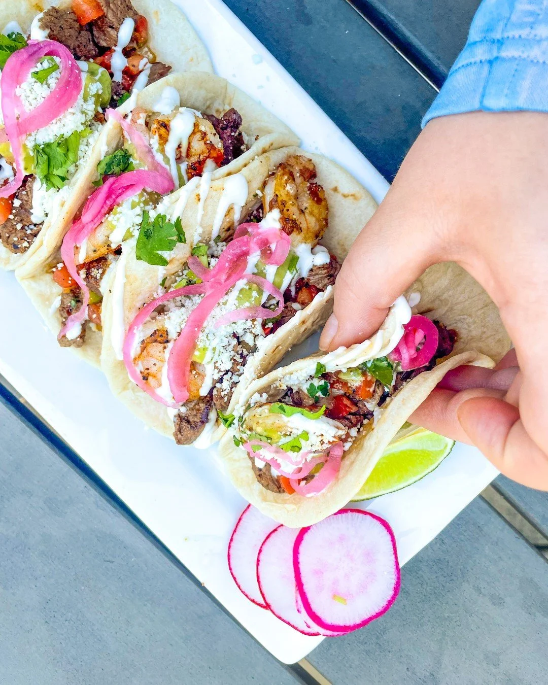 Surf meets Turf.  The both worlds. 

Our Surf &amp; Turf Tacos have beef and shrimp piled high on flour tortillas then topped with tomatillo salsa, crema, cotija, pico de gallo, cilantro, and pickled red onions. 

Only available on our August Special