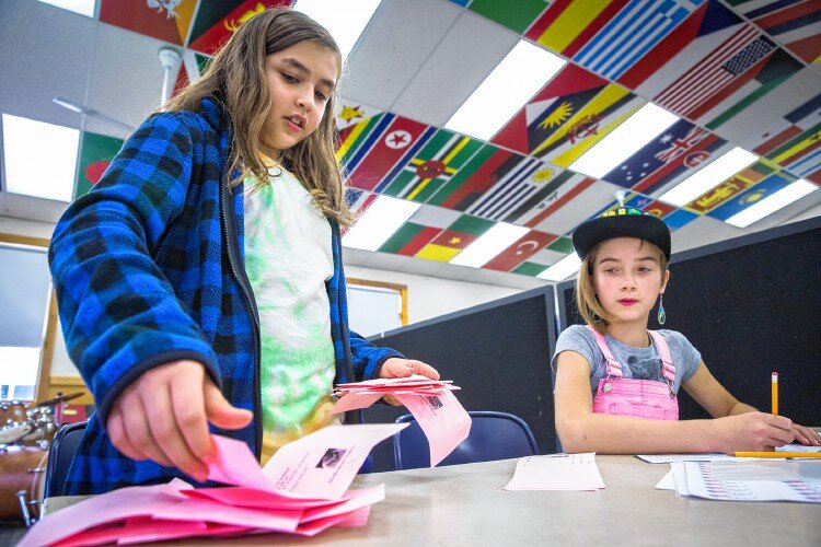  Talia Sharone, a fifth-grade student at the Center School in Greenfield, and Avi Rowland-Roth, also a fifth-grade student, count ballots during their mock election on Tuesday. “Shellizabeth Warren” was declared the new president. Recorder Staff/Matt