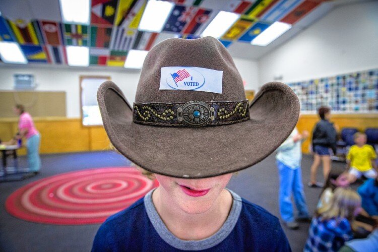  Rollie Schaffer Grinwas, a 4th grade student at the Center School in Greenfield wears his “I Voted” sticker on his cowboy hat. 