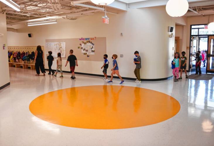  Students enter the new Greenfield Center School off of Bernardston Road in Greenfield on Wednesday. Staff Photo/Paul Franz 