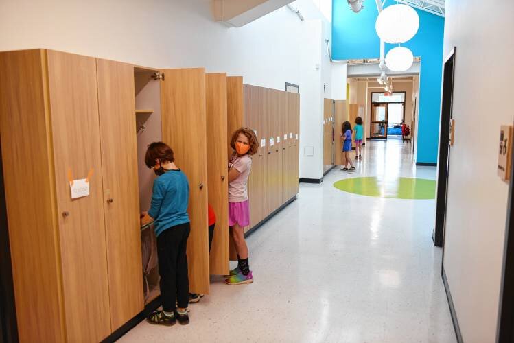  Students use their lockers at the new Greenfield Center School off of Bernardston Road in Greenfield on Wednesday. Staff Photo/Paul Franz 