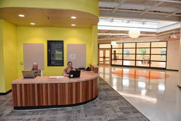  In the reception area of the new Greenfield Center School on Bernardston Road are Business Manager Veronica Phaneuf and Assistant to the Head of School Amanda Richard. STAFF PHOTO/PAUL FRANZ 