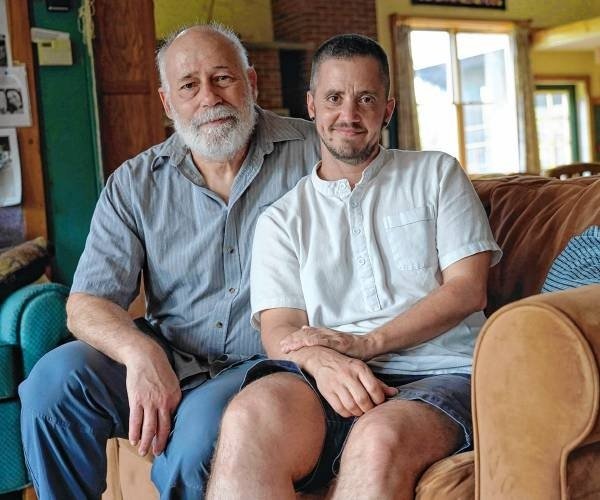    Ted Rau of Amherst, right, with his partner, Jerry Koch-Gonzalez. Both are interviewed in the new book “Authentic Selves: Celebrating Trans and Nonbinary People and Their Families.” PHOTO BY JILL MEYERS   