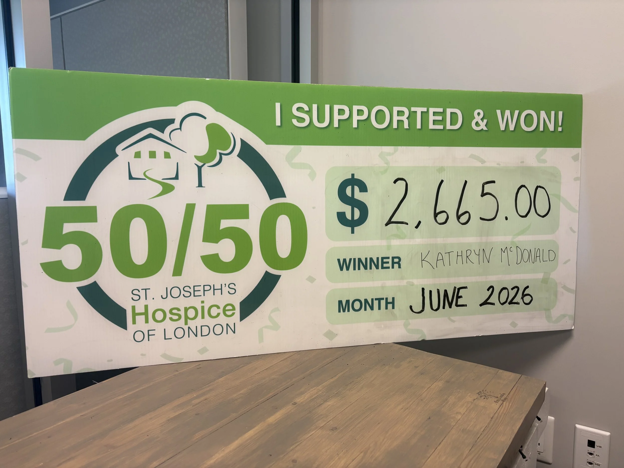 June 50/50 cheque