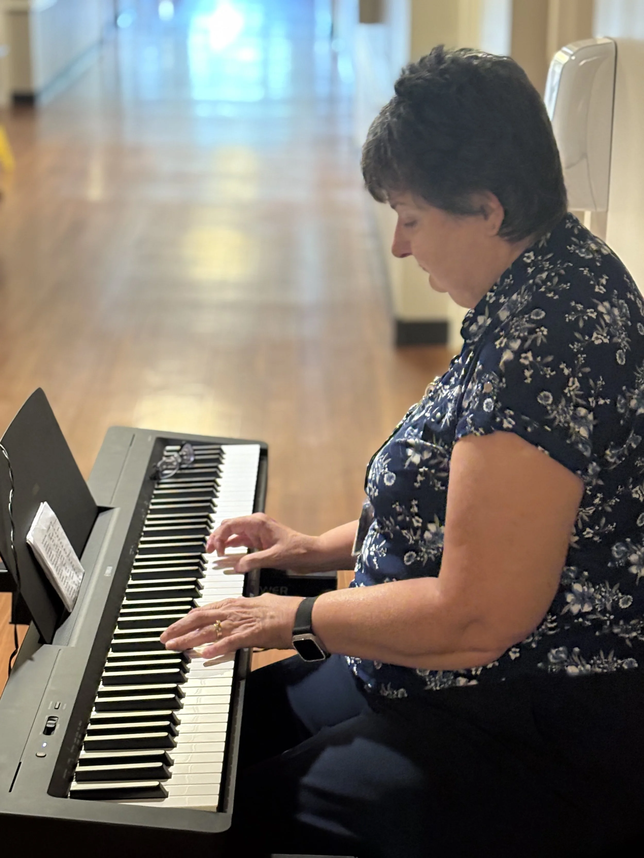 volunteer playing piano