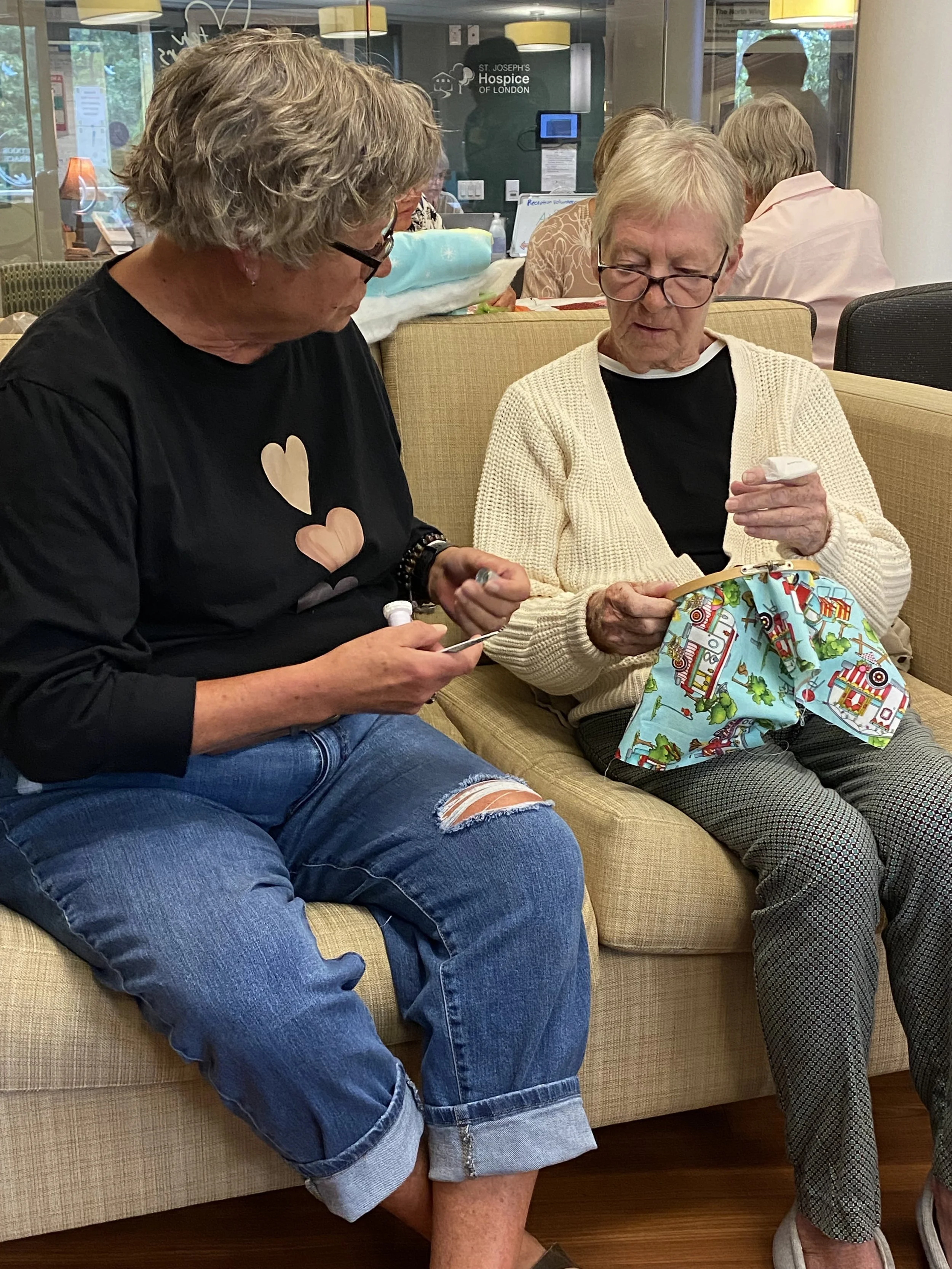 volunteer working with resident