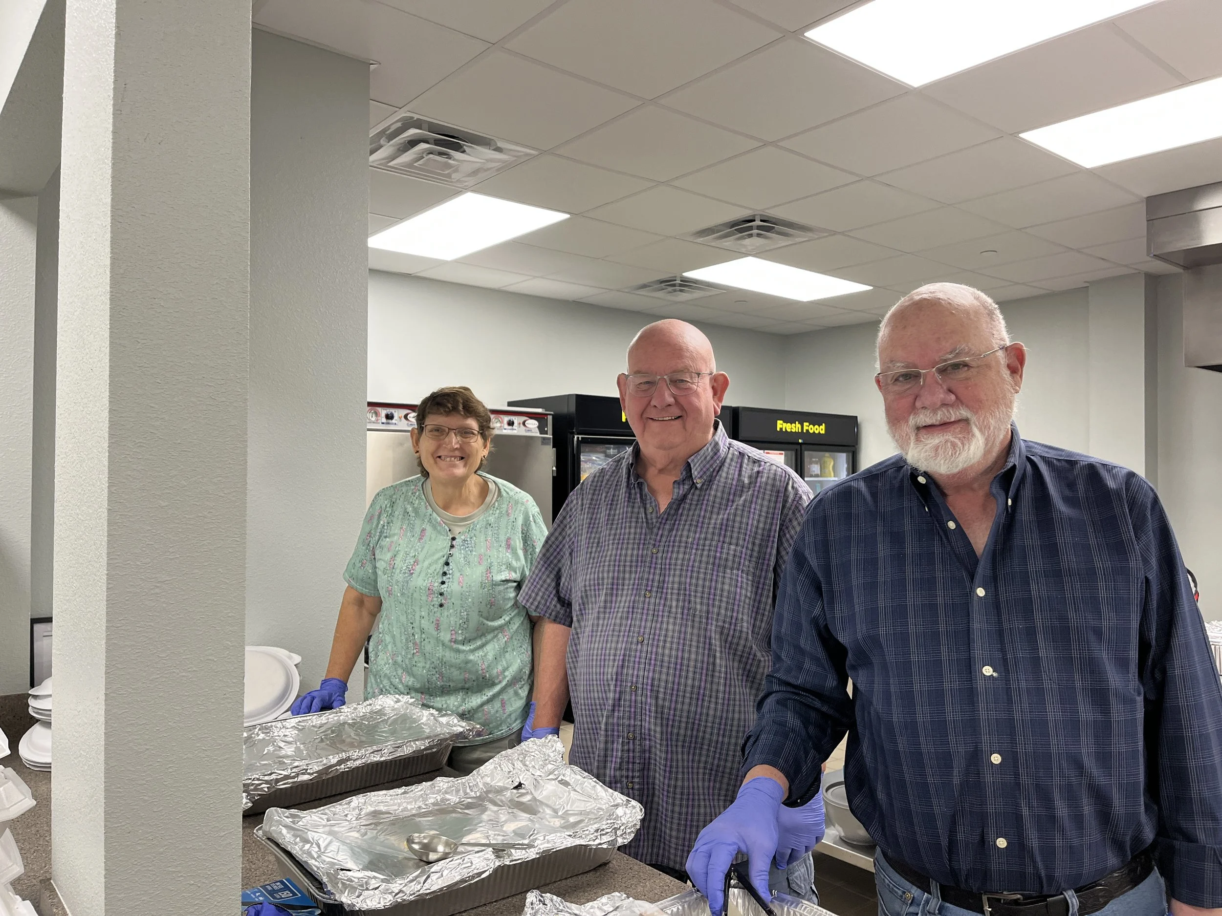 IMG_2418 Becky Pastor Dave and Rich Serving.JPG