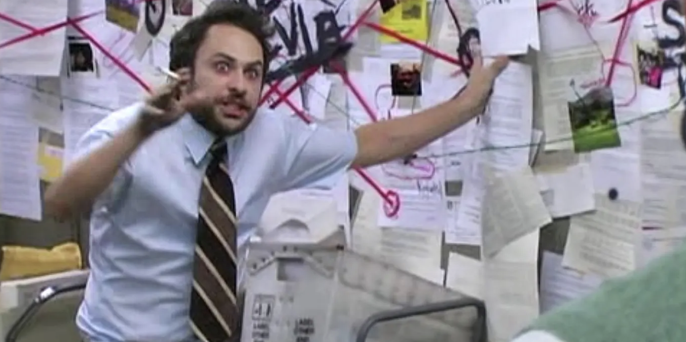 photo of Charlie from "It's Always Sunny in Philadelphia" in front of a bulletin board with documents
