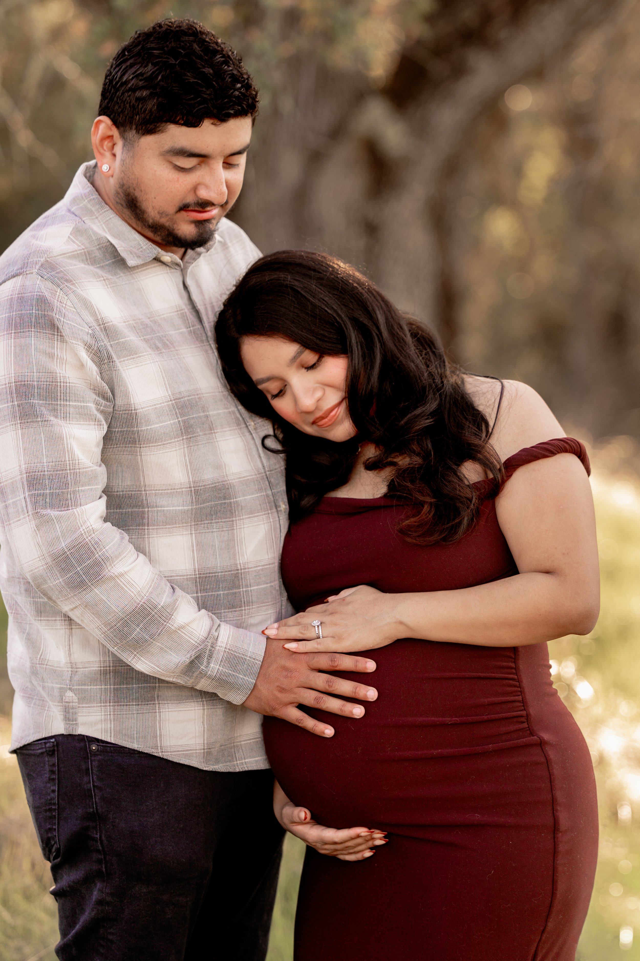 Maternity Session in Fair Oaks Califoria Couple Holding Baby