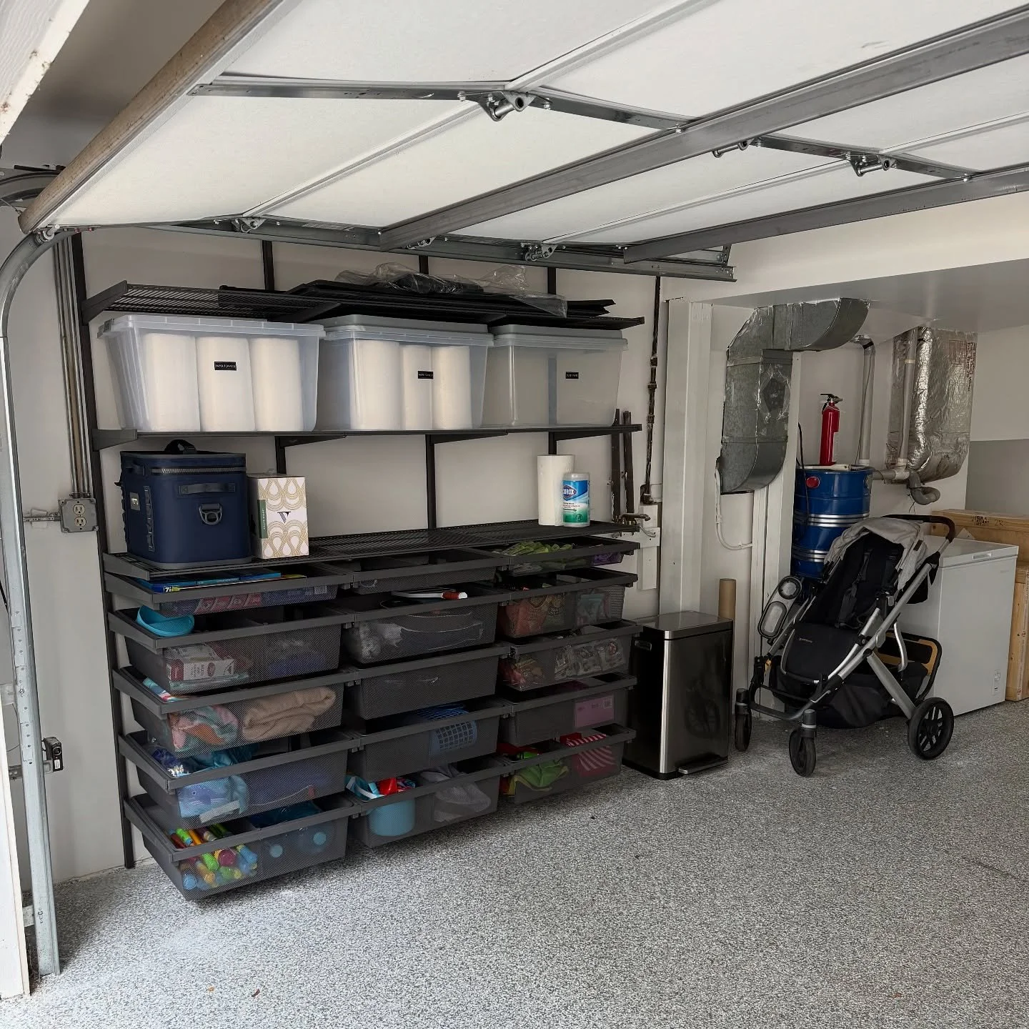 This garage got a complete transformation from top to bottom 🚗 ✨ 

What was once a cluttered, underutilized space is now bright, organized, and highly functional. 

🌟New flooring for a clean, durable foundation
🌟Freshly painted walls &amp; ceiling