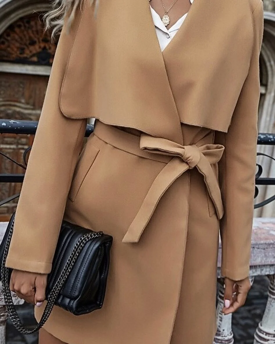 &ldquo;Rich Chick Trench Coat&rdquo; is now available online for shipping or pickup. Shop now 🛒