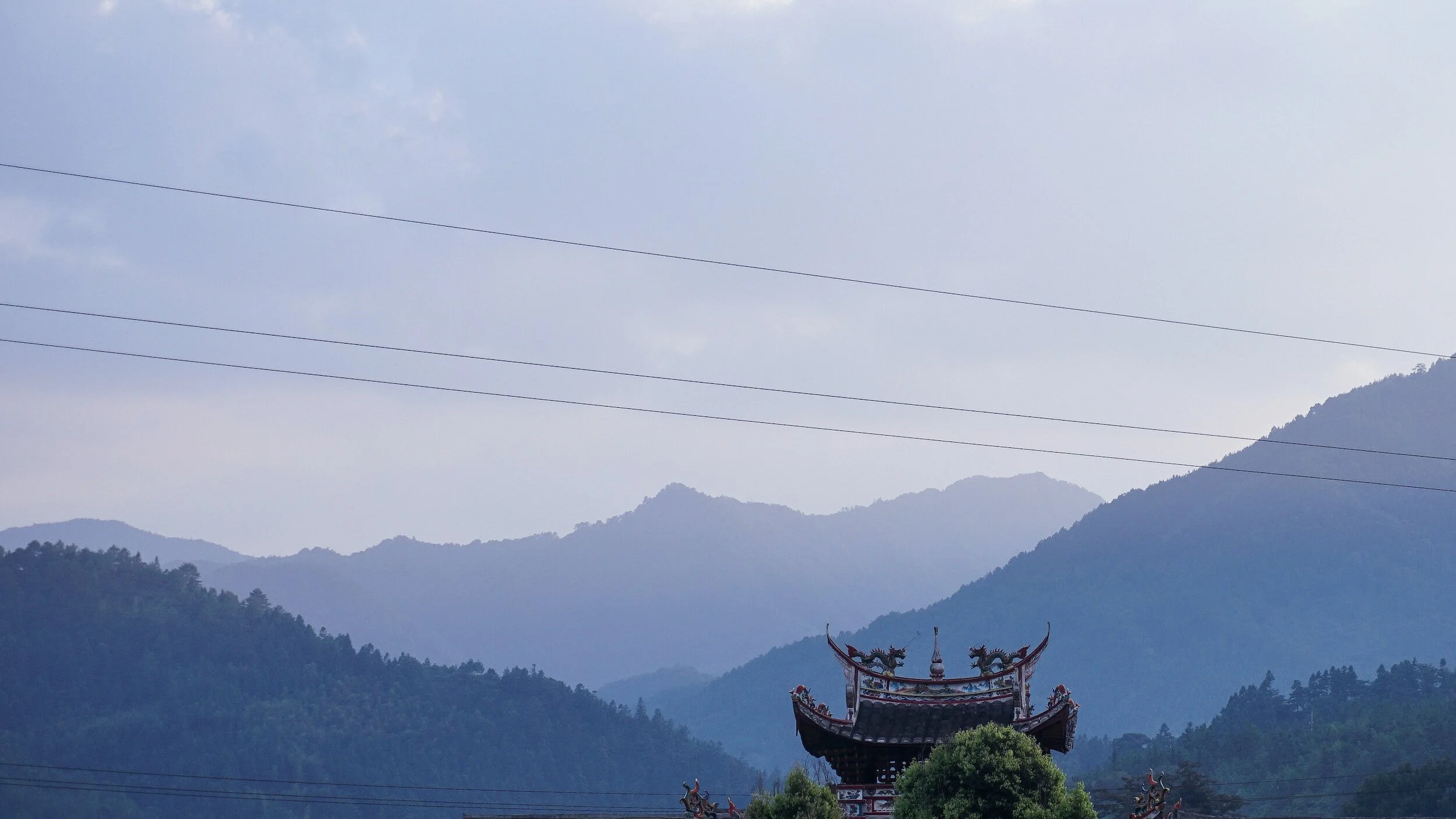 mountains with top of temple