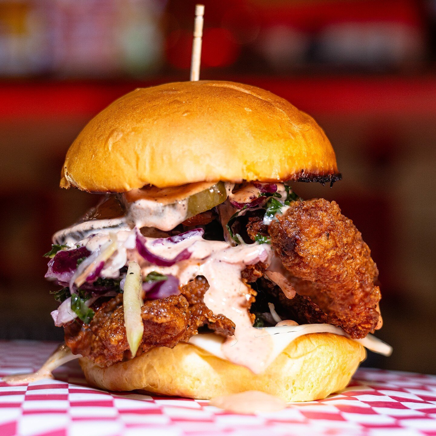 Indulge the @kukri.chicken  Chicken Sandwich 🐓 featuring crispy hand-breaded chicken tenders, fresh slaw, tangy pickles, and our zesty 🔥SPICY🔥 Kukri Sauce, all nestled in a soft brioche bun. 

Savor it with a side of fries or choose your preferred