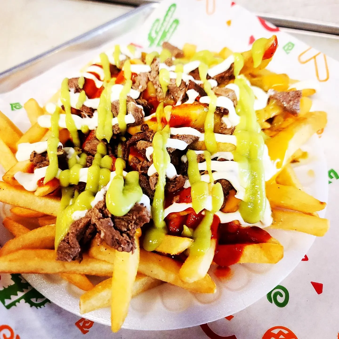 Are carne asada fries nachos? They should be. Grab some at @tinos.tacos and celebrate #NationalNachoDay.