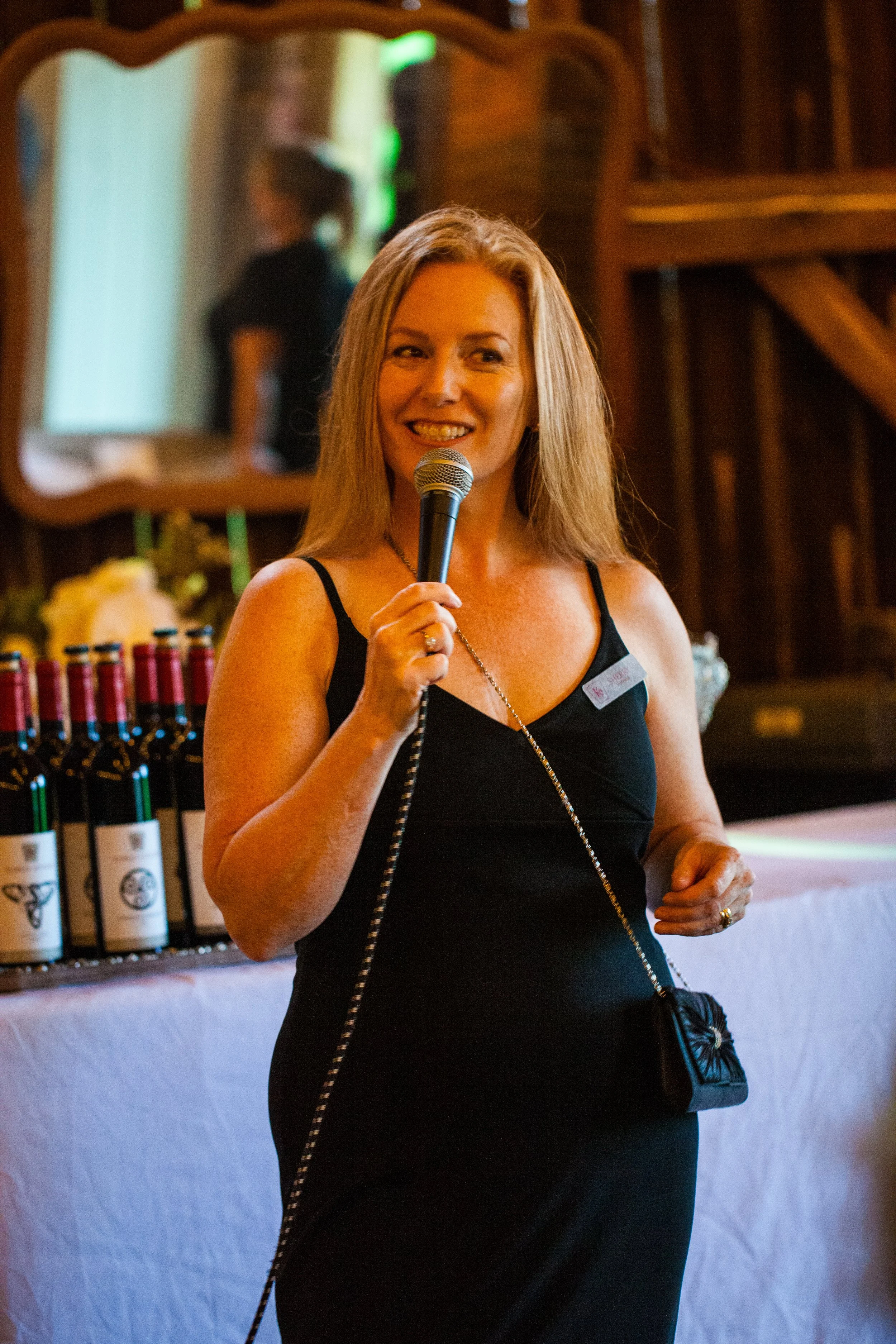 Sherry Presenting at Vintner's Dinner.jpg