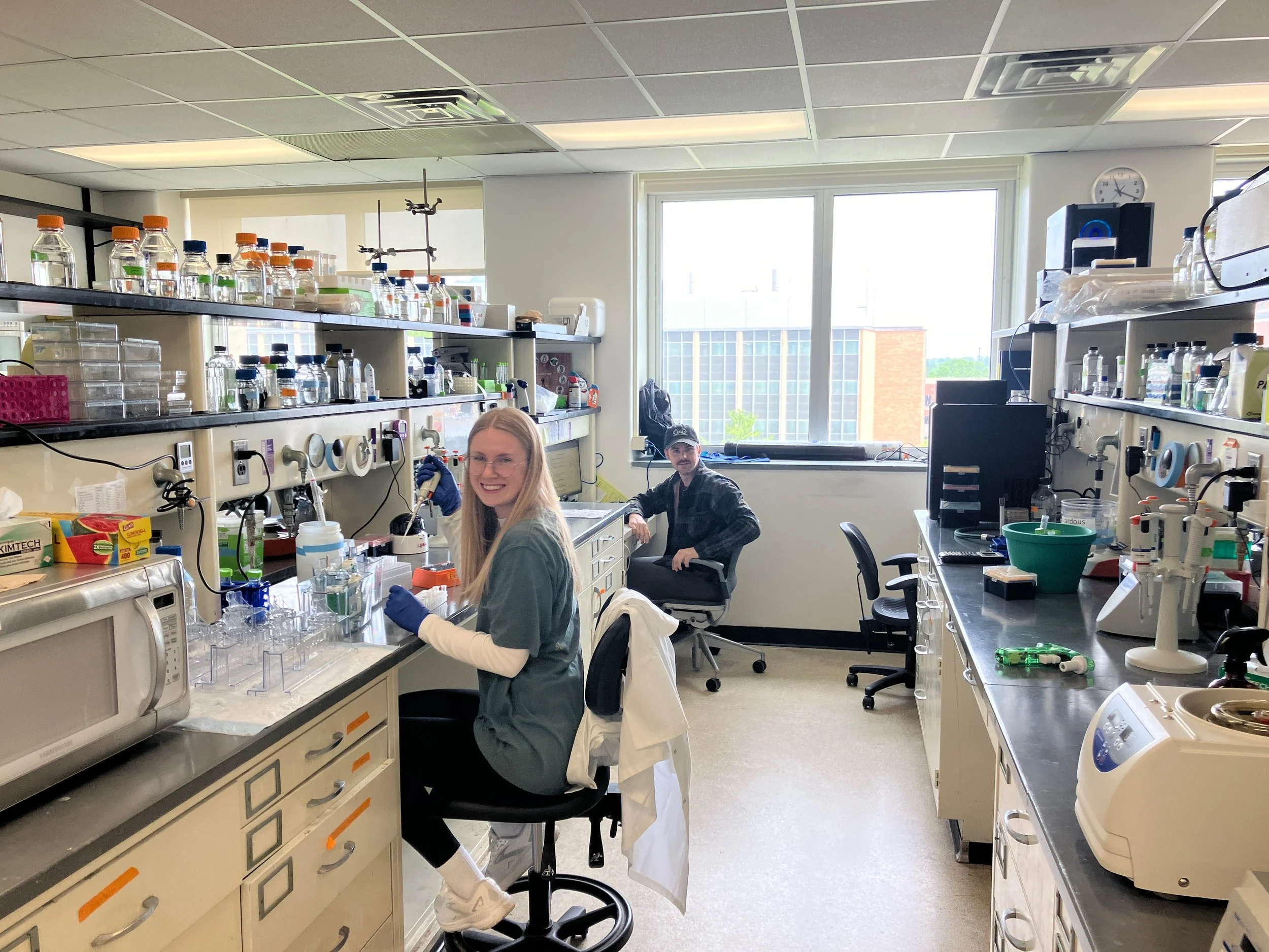 Ellen and Bradon at home in the lab